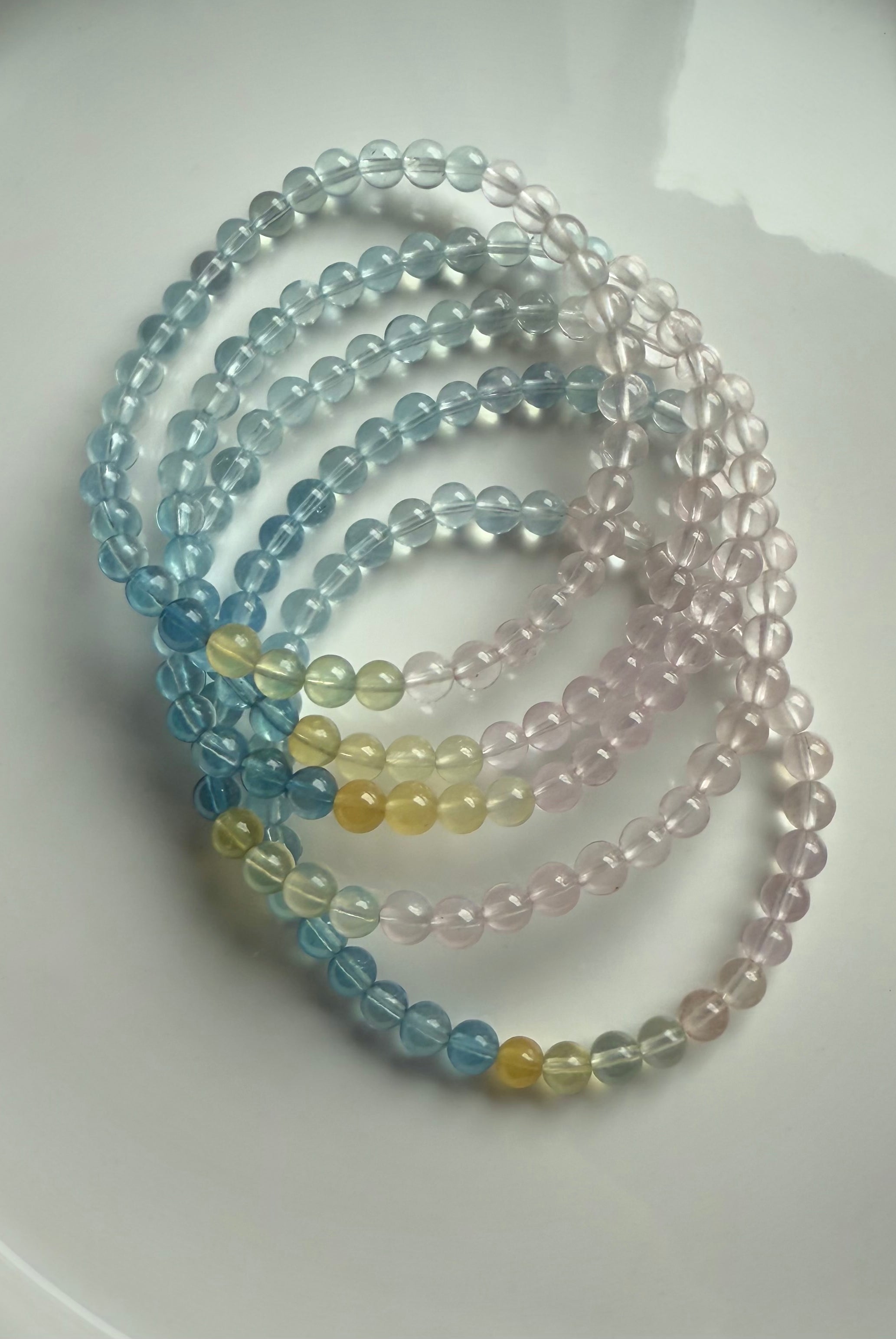 High quality morganite bracelets shown on a white plate