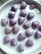 Lepidolite puffy hearts make a soothing pocket stone for stress relief + emotional support.