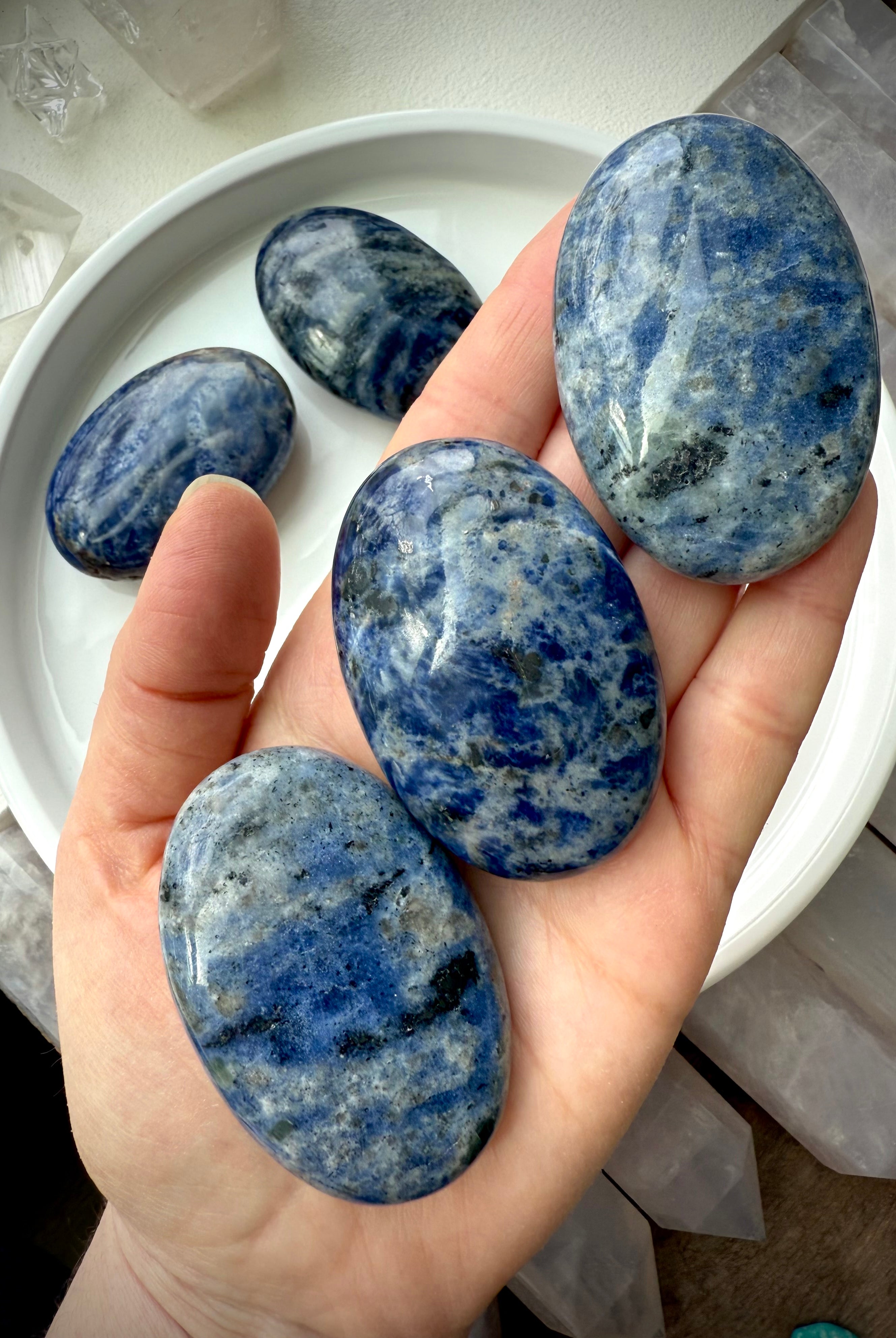 Meditate with a Sodalite Palm Stone, a Throat Chakra crystal of clear communication