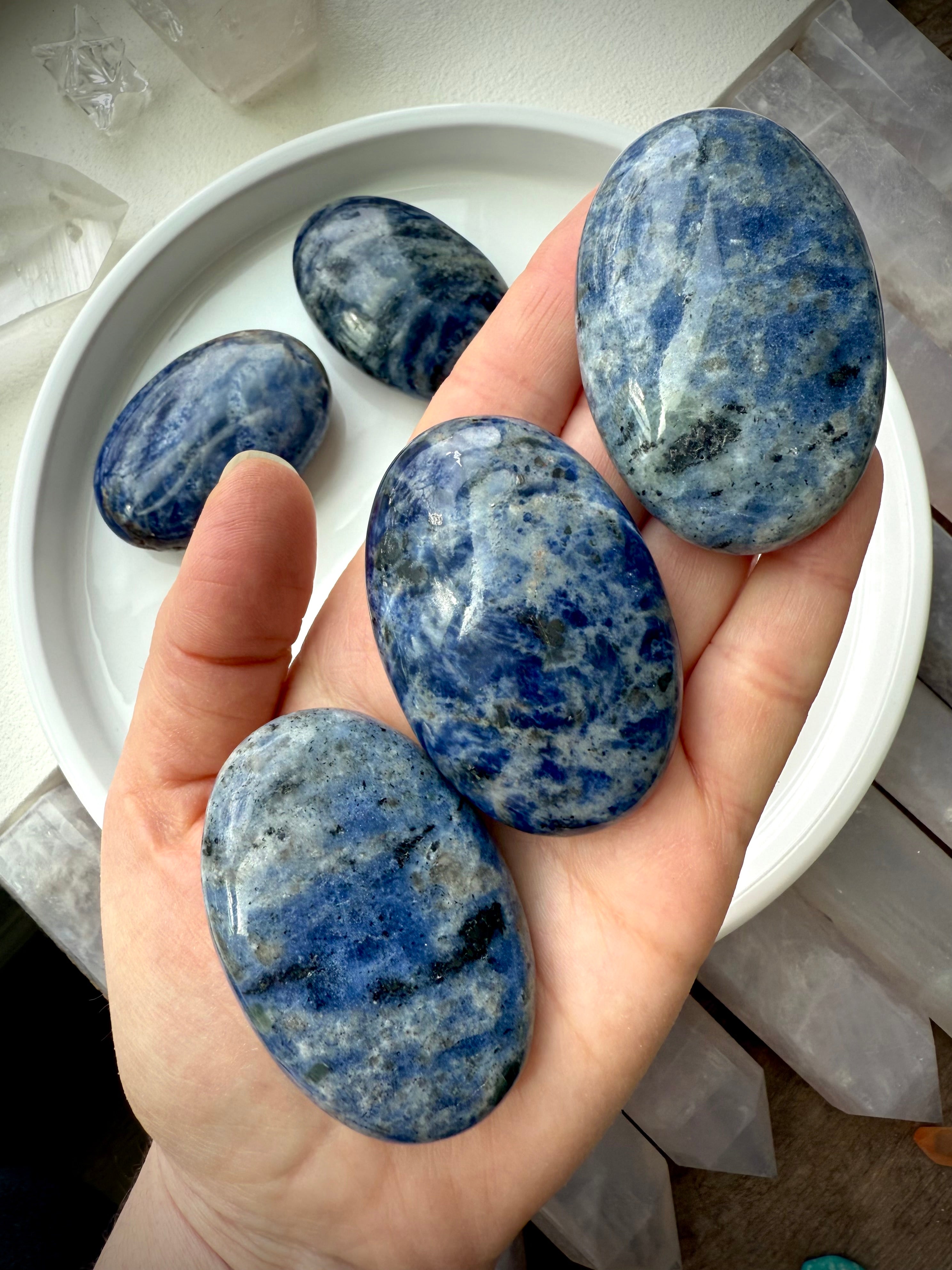 Meditate with a Sodalite Palm Stone, a Throat Chakra crystal of clear communication