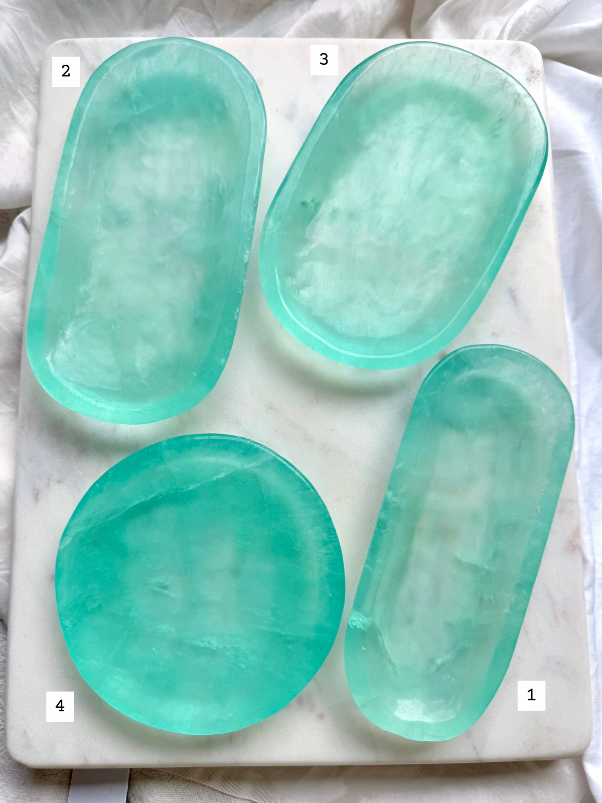 Translucent Green Fluorite crystal bowls numbered for one-of-a-kind selection