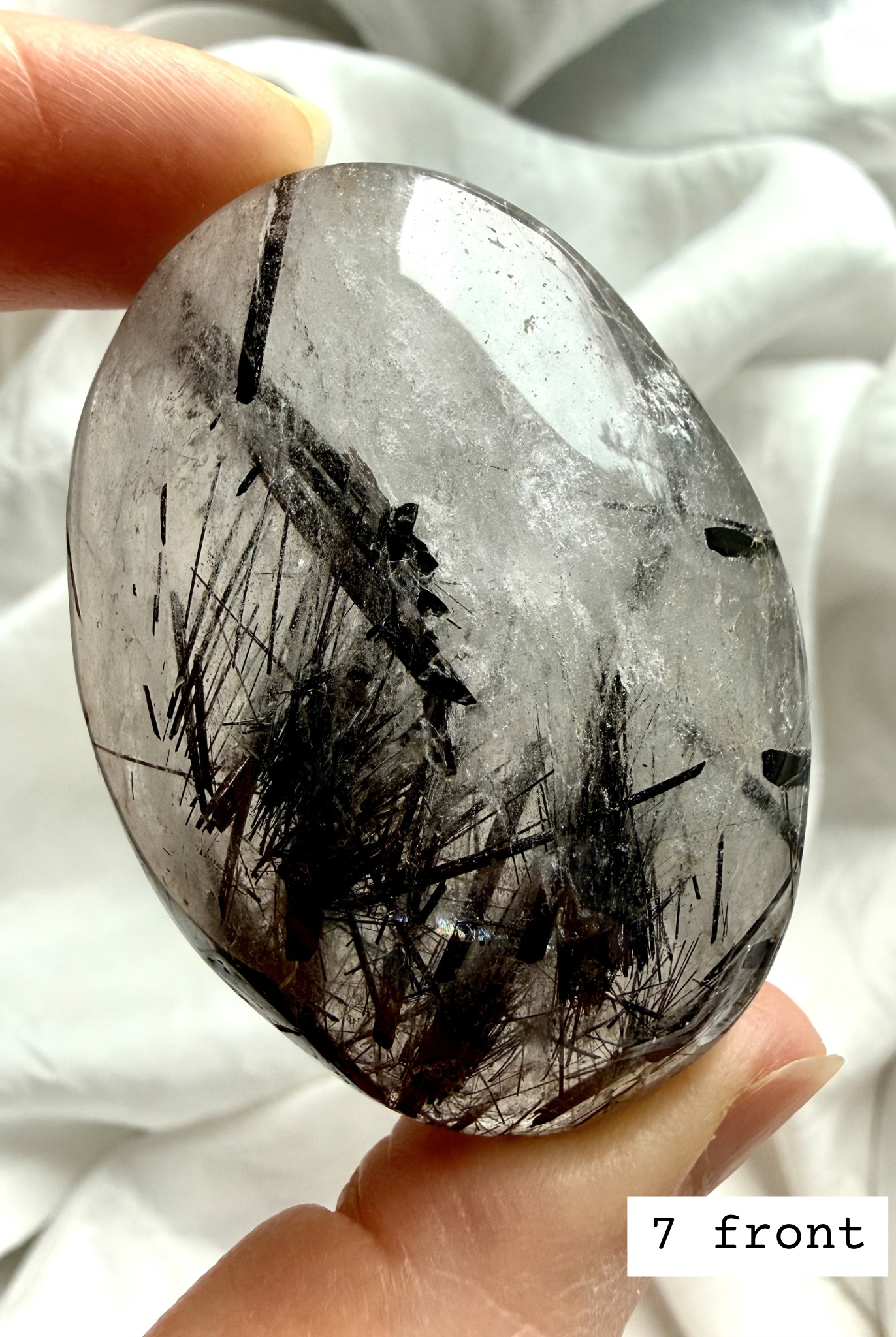 Black Tourmaline in Quartz palm stone 7 front view Tourmalinated Quartz protection crystal