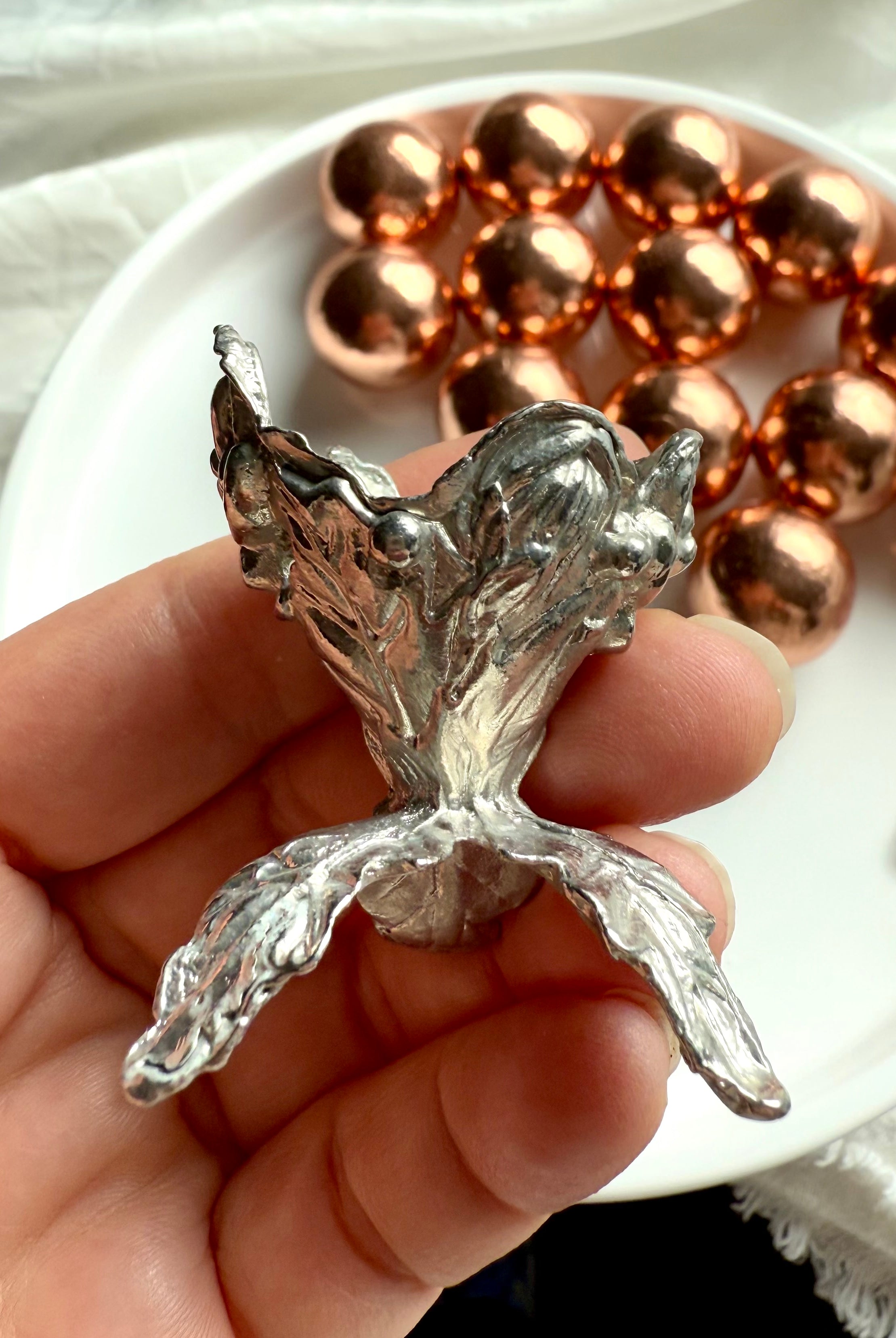 Our mini sphere stand made from solid cast metal fits small crystal spheres