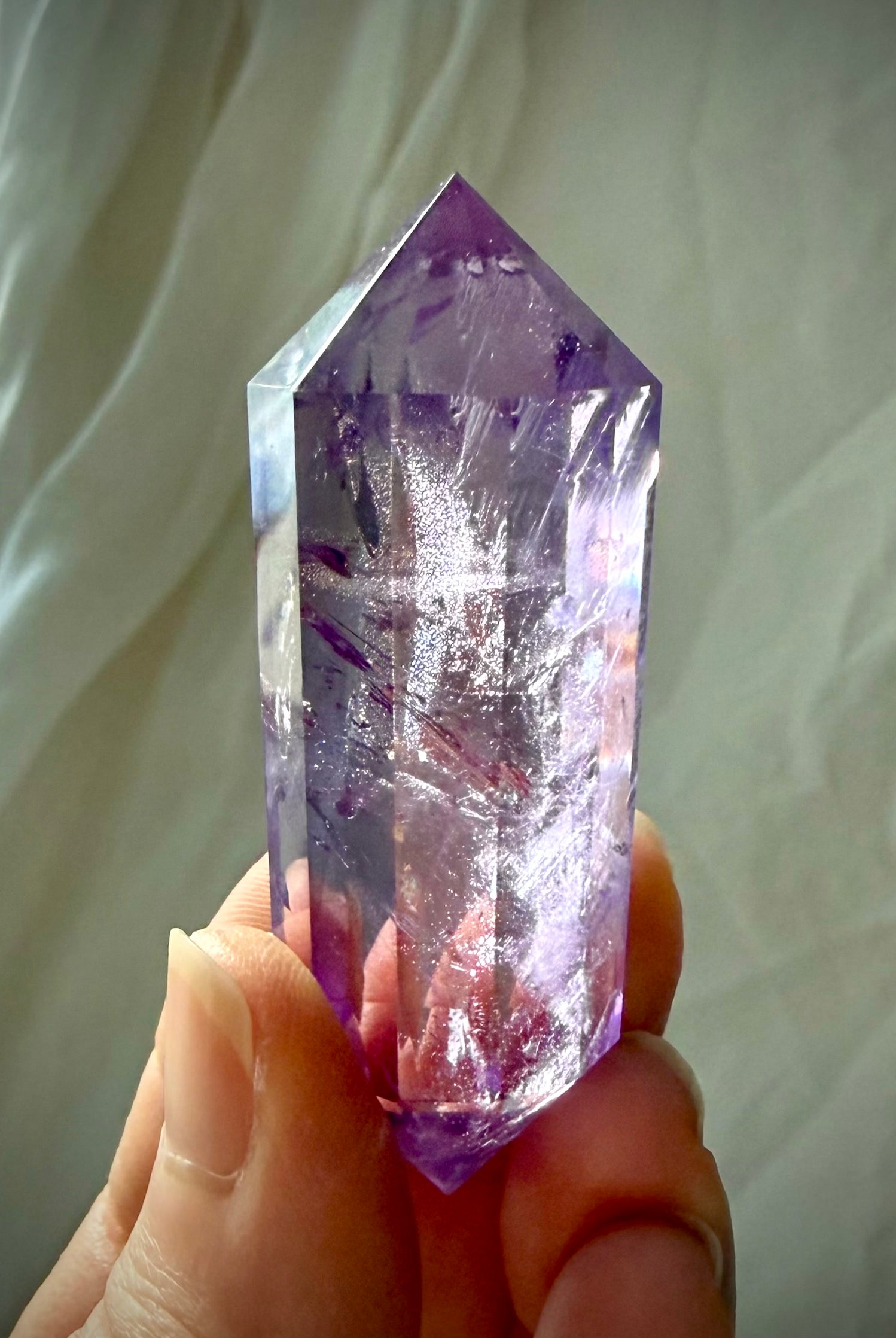 Collector-quality Amethyst Vogel crystal with rainbow flashes and exceptional clarity