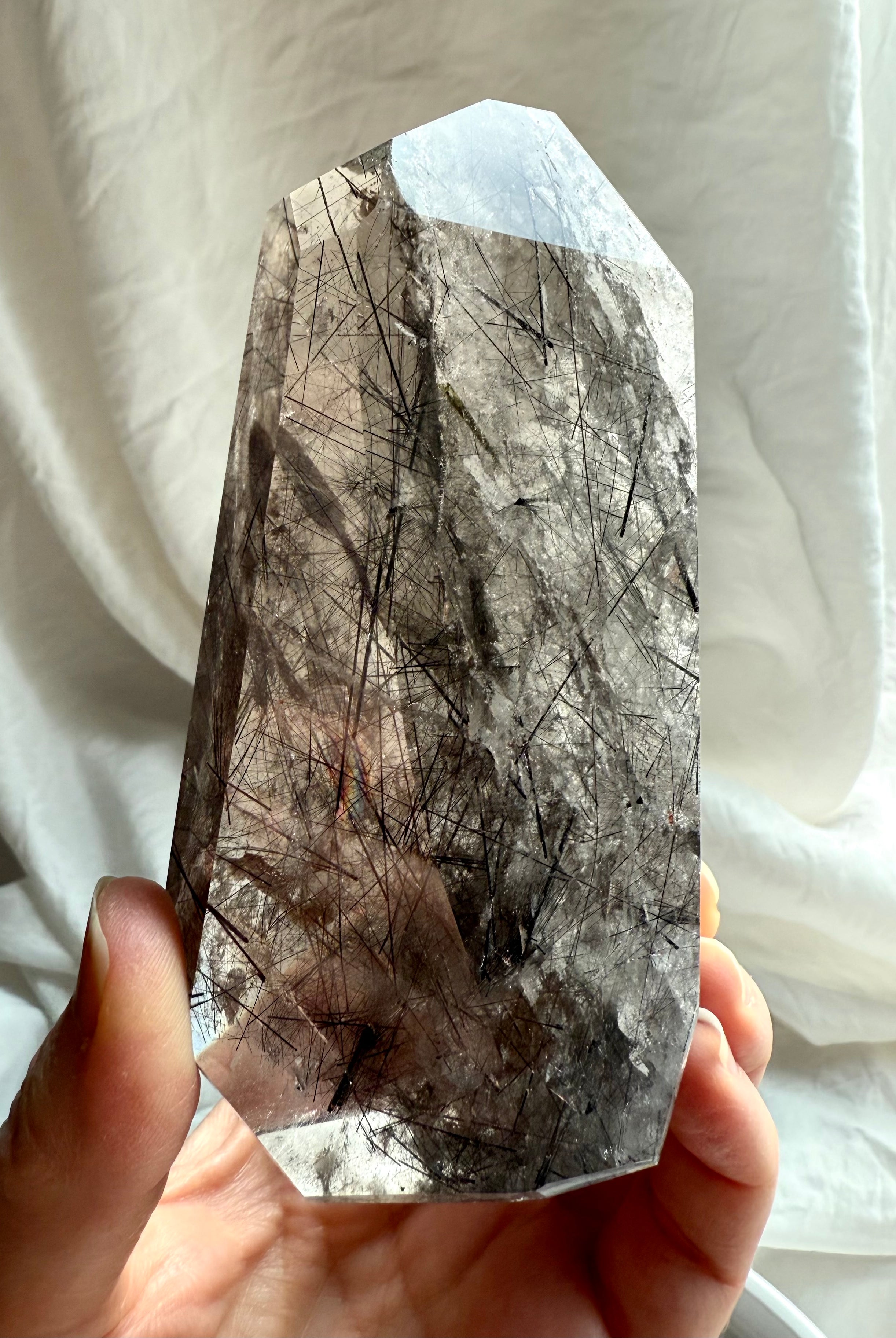 Large grounding crystal tower featuring Black Tourmaline suspended in smoky translucent Quartz