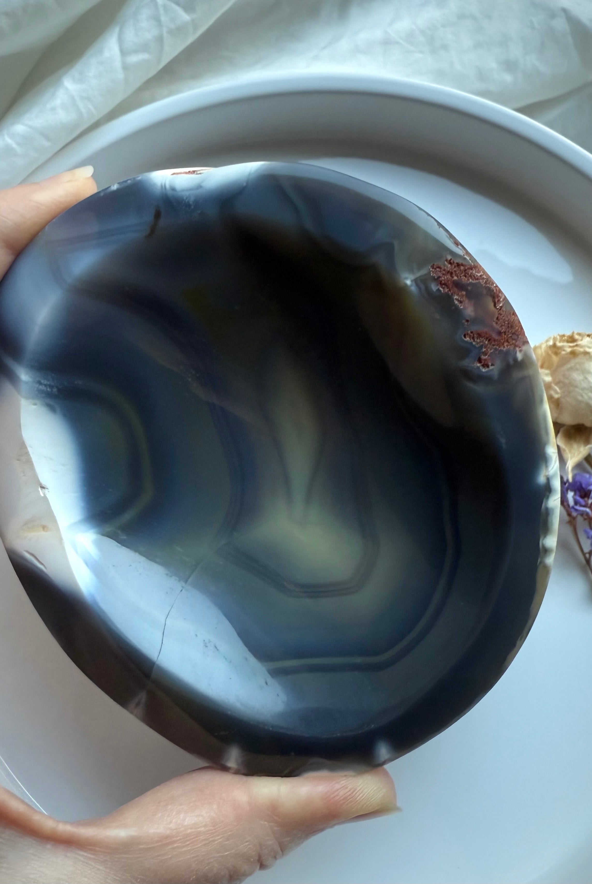 Large Orca Agate offering bowl held in hands, showing deep swirling patterns — soothing grounding crystal bowl for protection, calm, and ceremonial use.