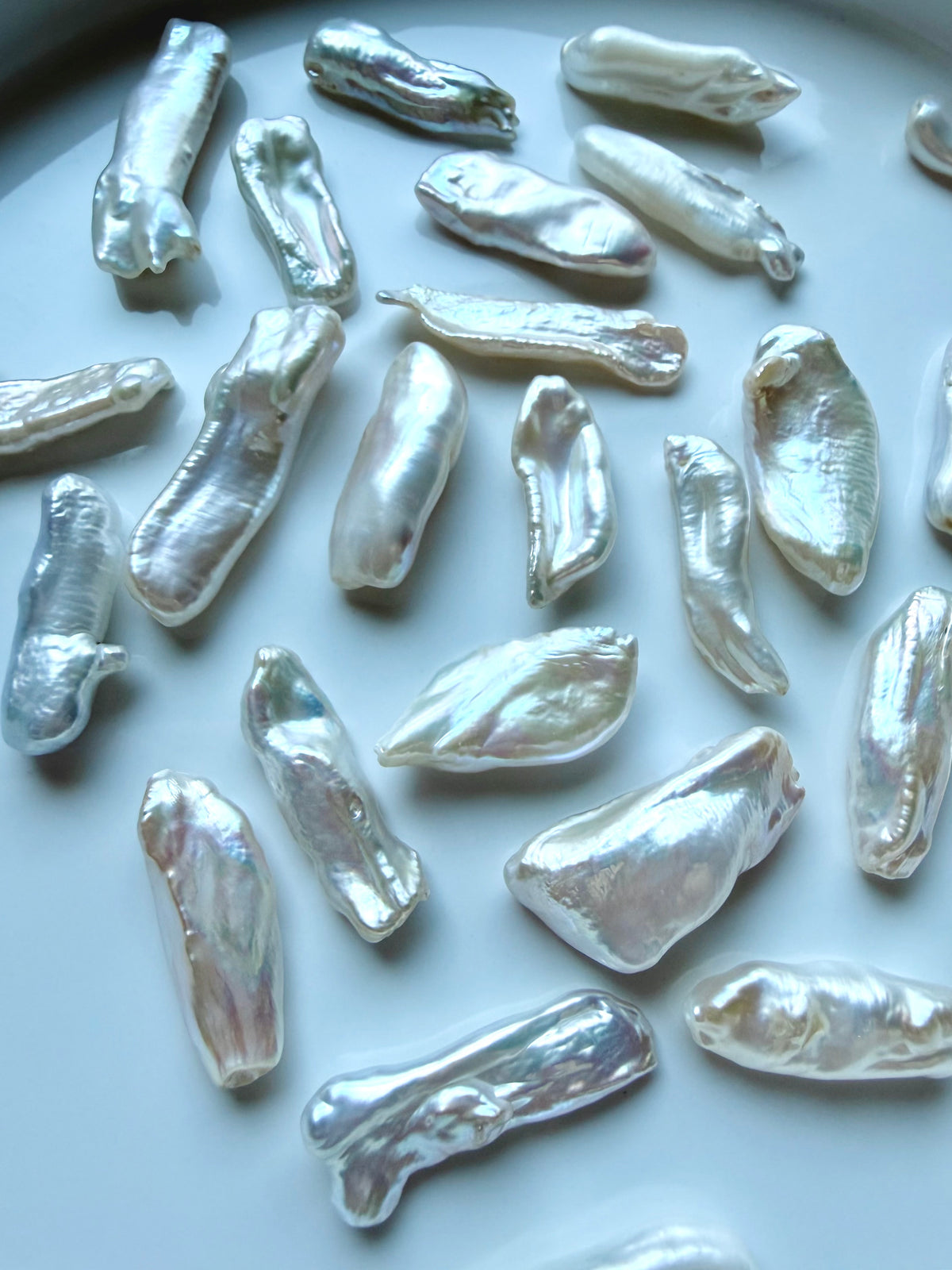 Loose freshwater Baroque Stick Pearls with silvery white luster, iridescence and unique natural shapes