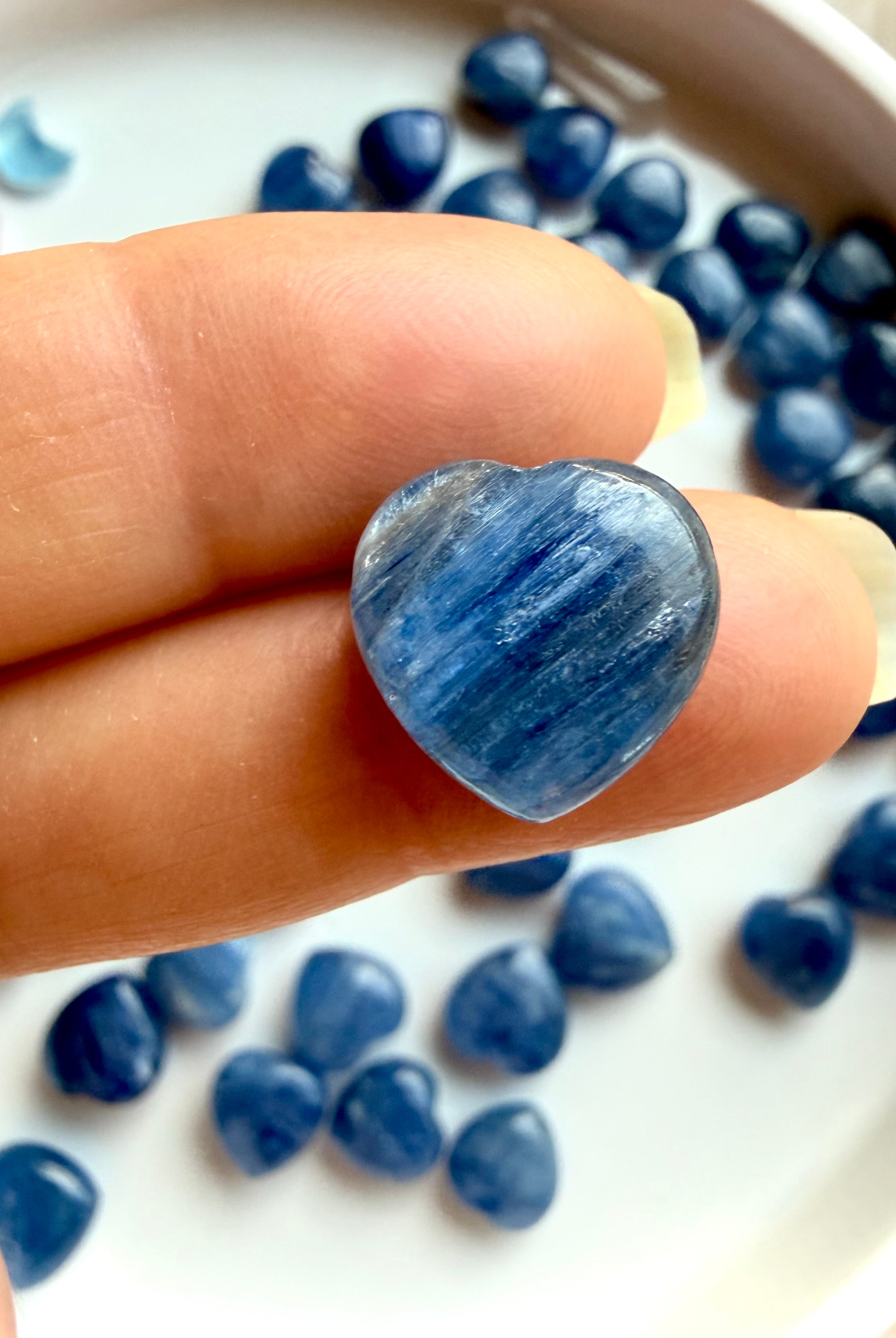 Mini Blue Kyanite heart crystal with luminous blue striations and subtle quartz matrix, throat chakra stone for clarity and communication