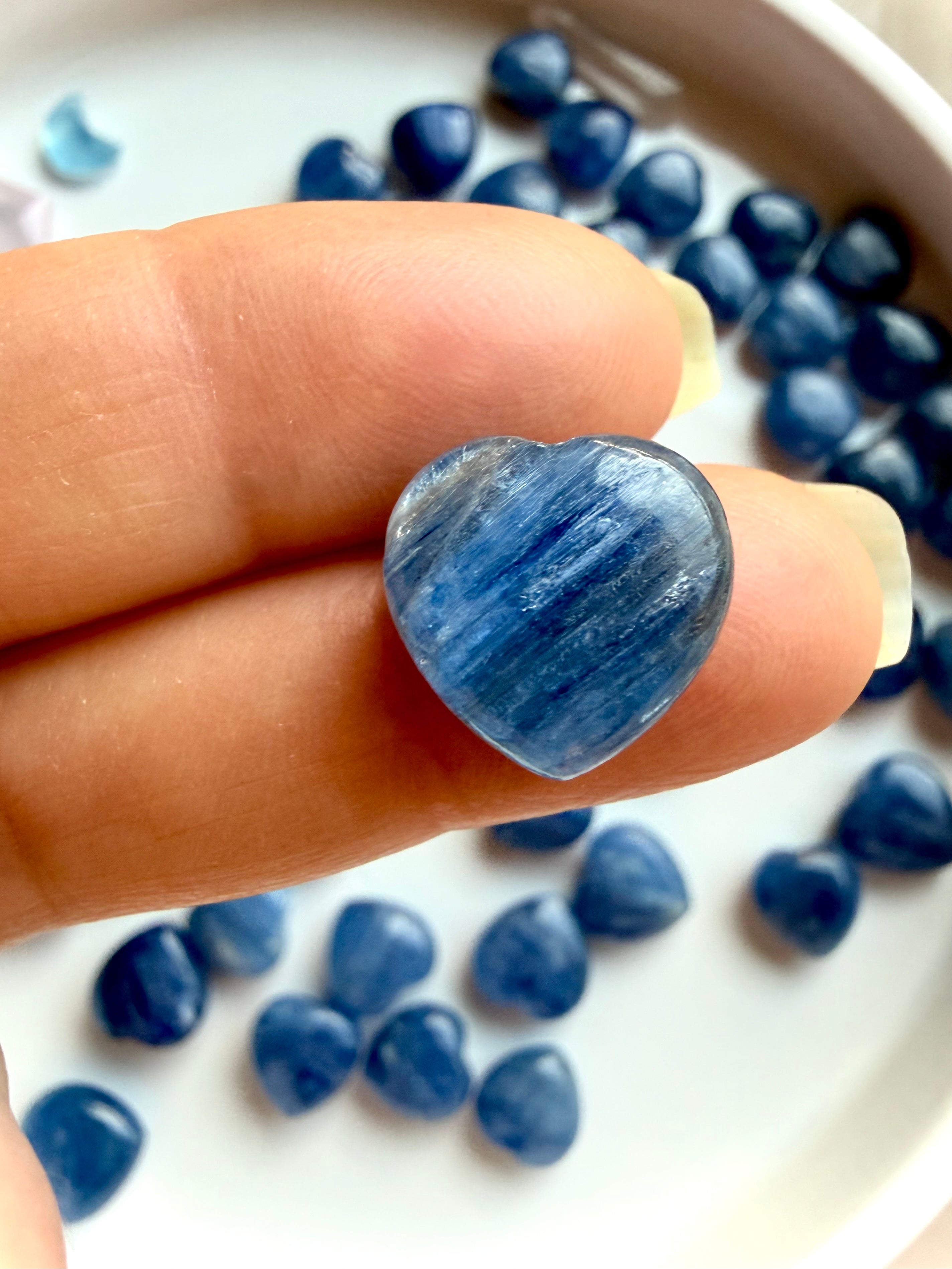 Mini Blue Kyanite heart crystal with luminous blue striations and subtle quartz matrix, throat chakra stone for clarity and communication