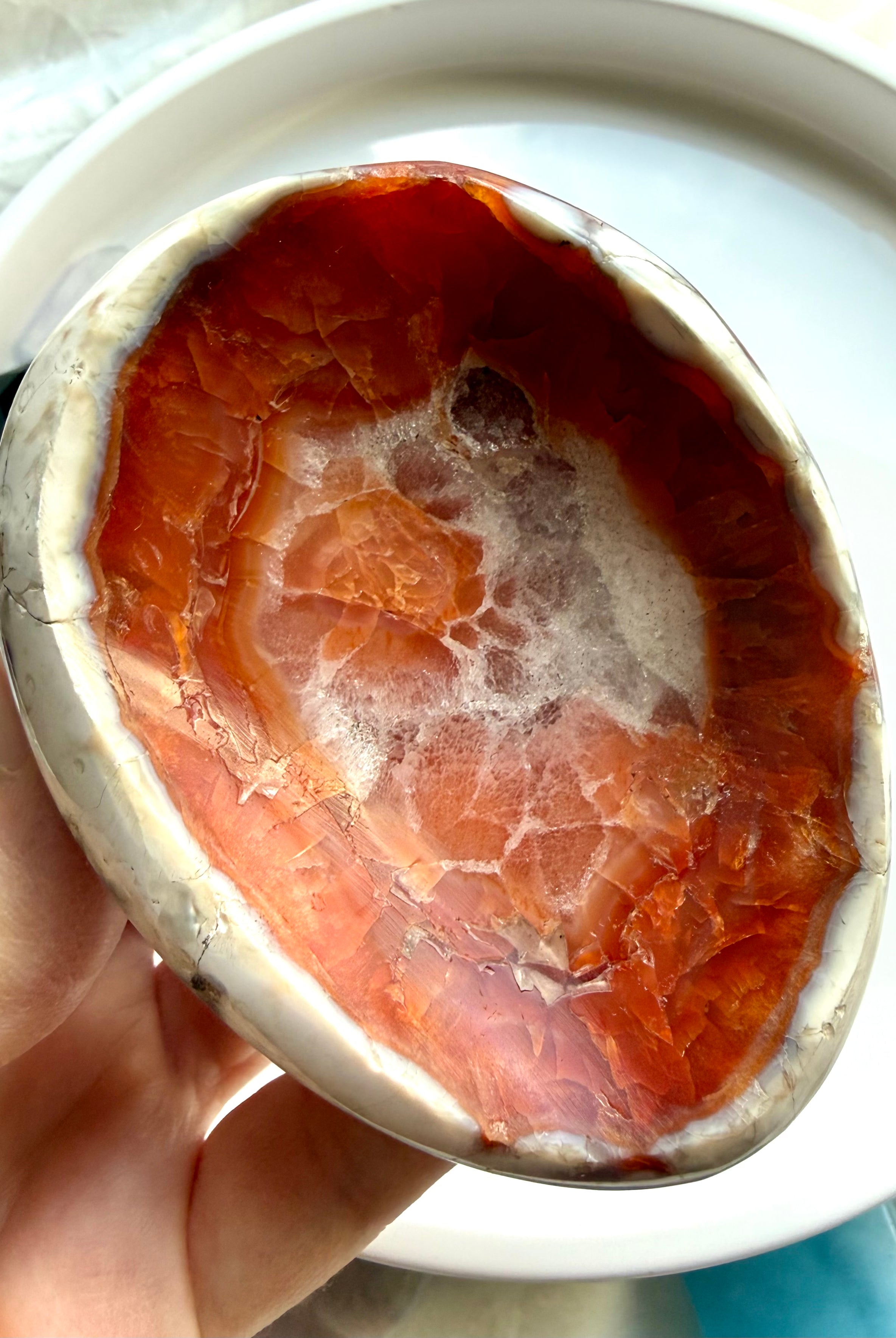 red carnelian crystal bowl with white quartz druzy core and banded agate edges