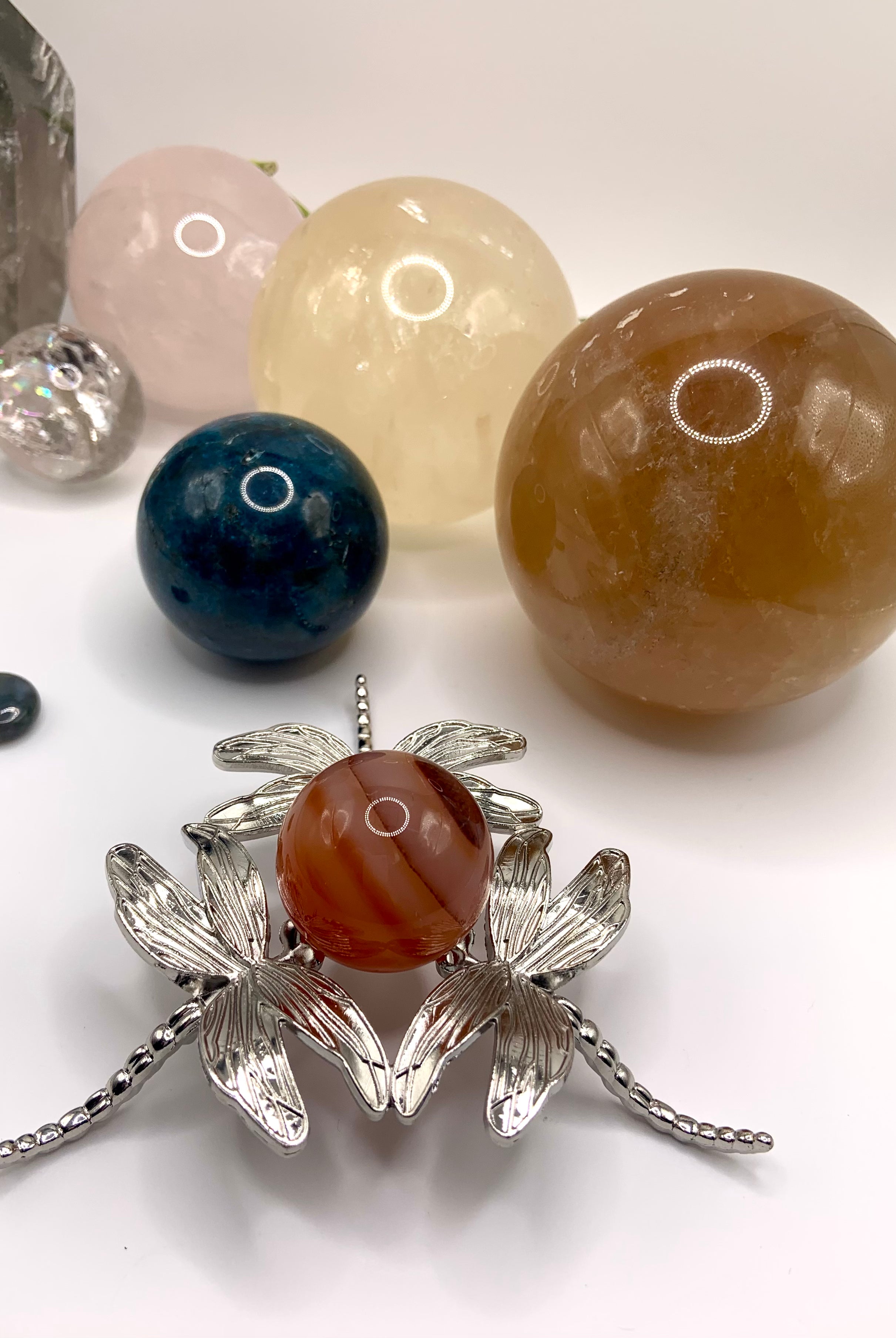 The larger sphere stand option shown with a 30mm carnelian sphere