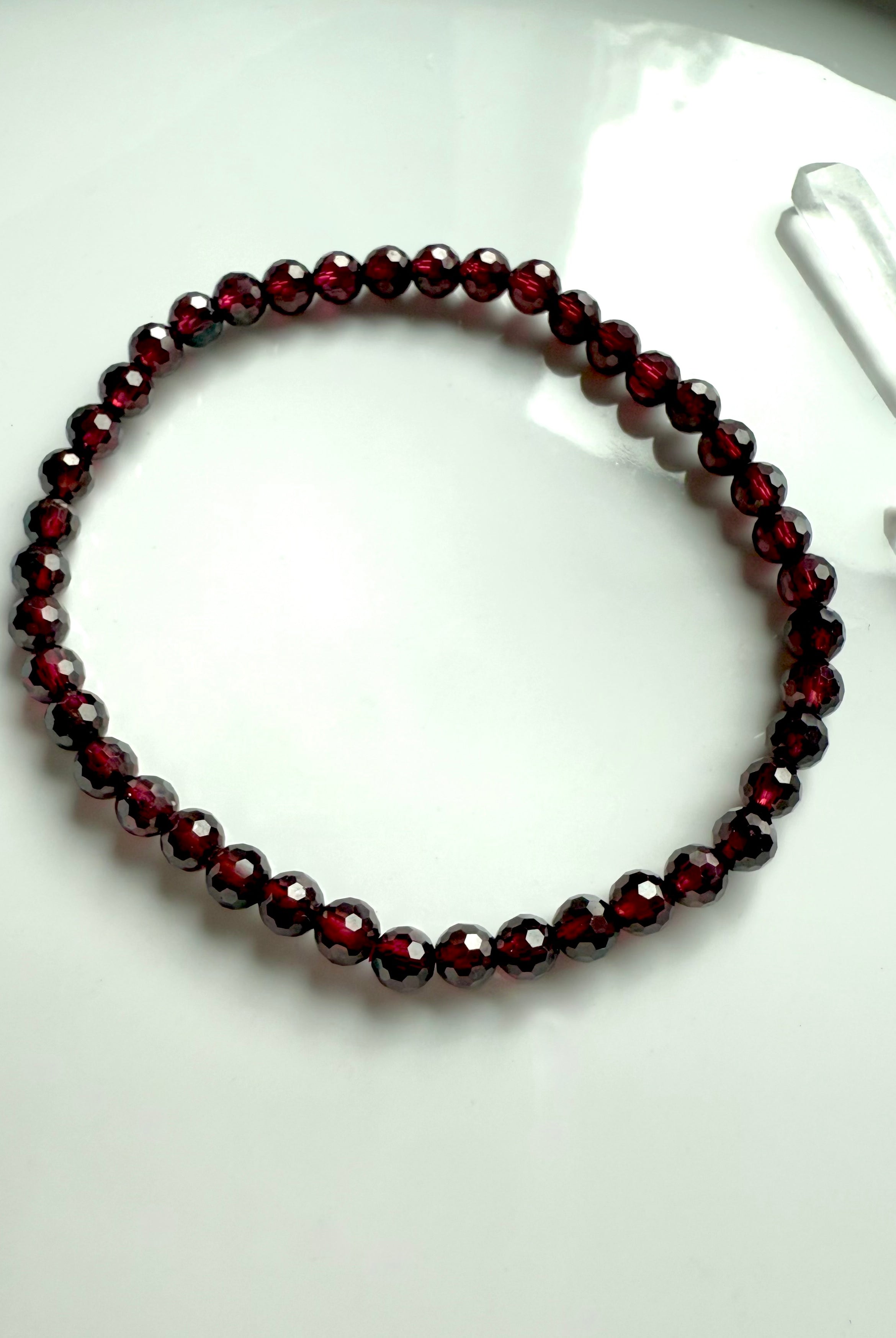 Dainty single strand Faceted Almandine Garnet Bracelet with a lovely red color.