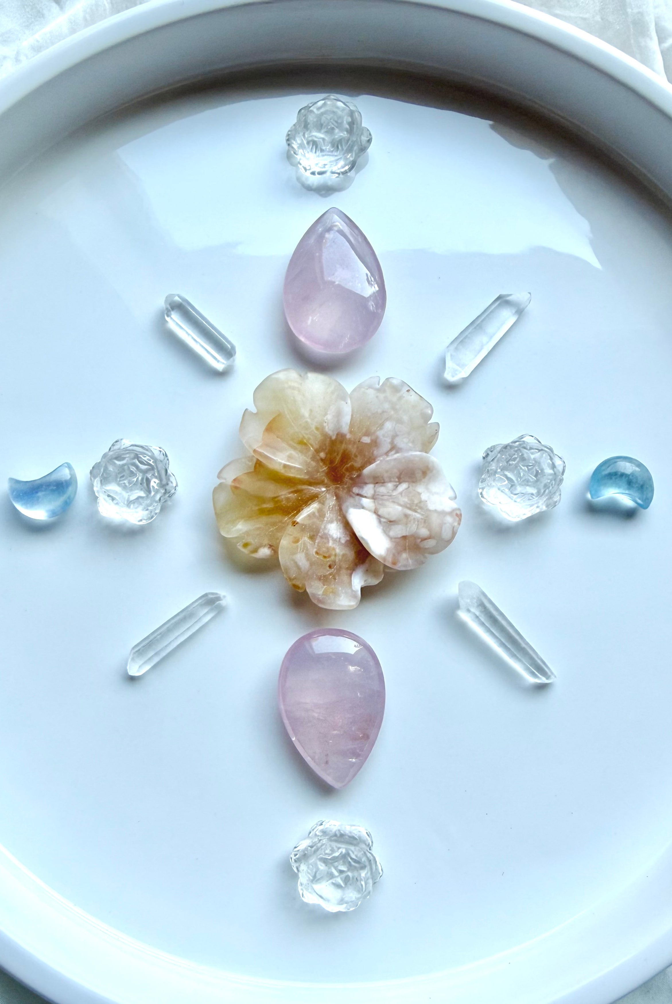 Crystal grid with mini Clear Quartz lotus flowers, Rose Quartz teardrops, Aquamarine moons, Flower Agate and Quartz points