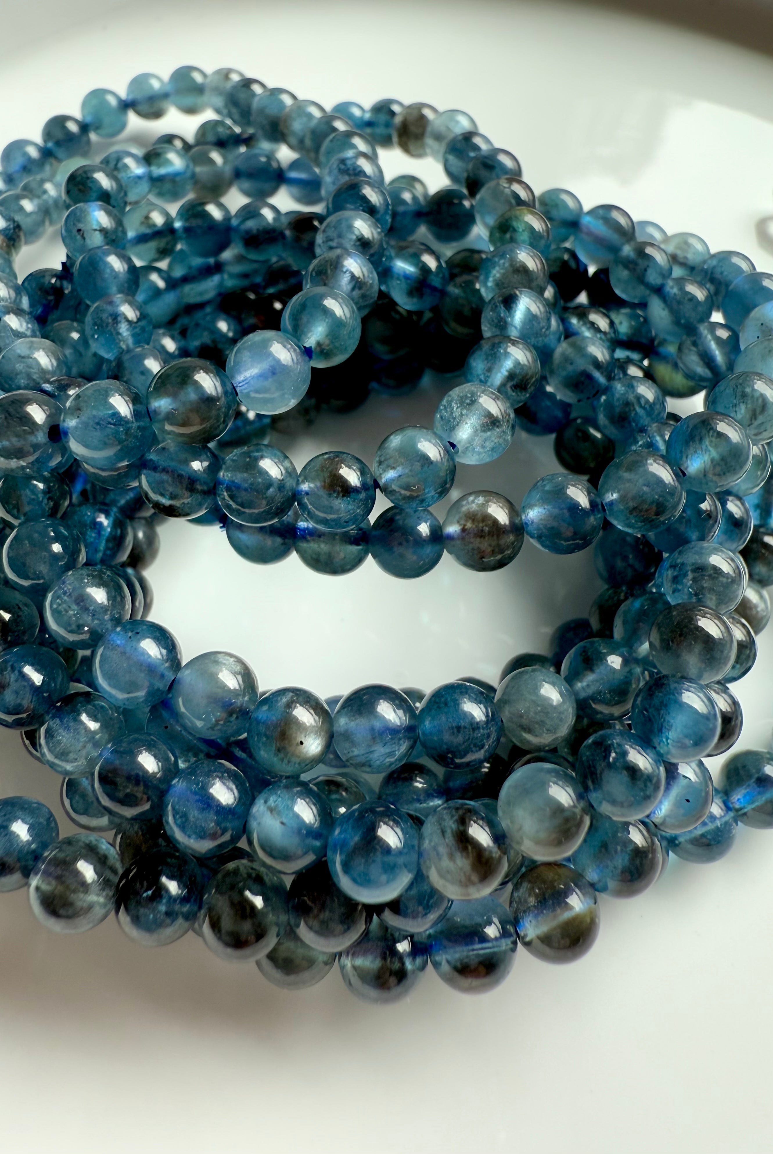 Rare deep blue Aquamarine Bracelets with Black Tourmaline + cat's eye shimmer to adorn your wrists.