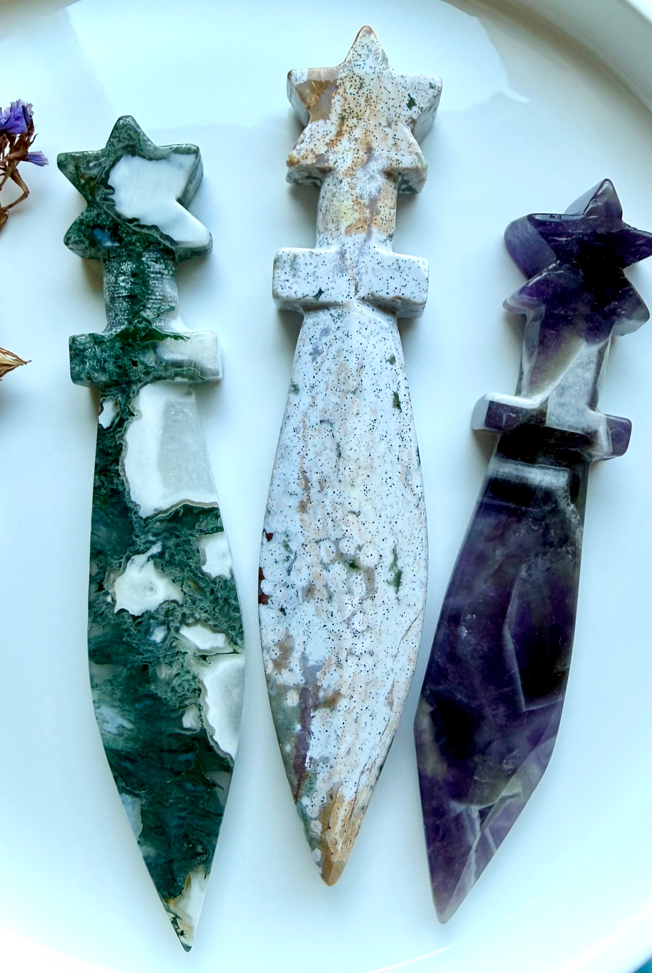 Crystal star knife carvings in Moss Agate, Ocean Jasper, and Dream Amethyst for rituals and altar decor