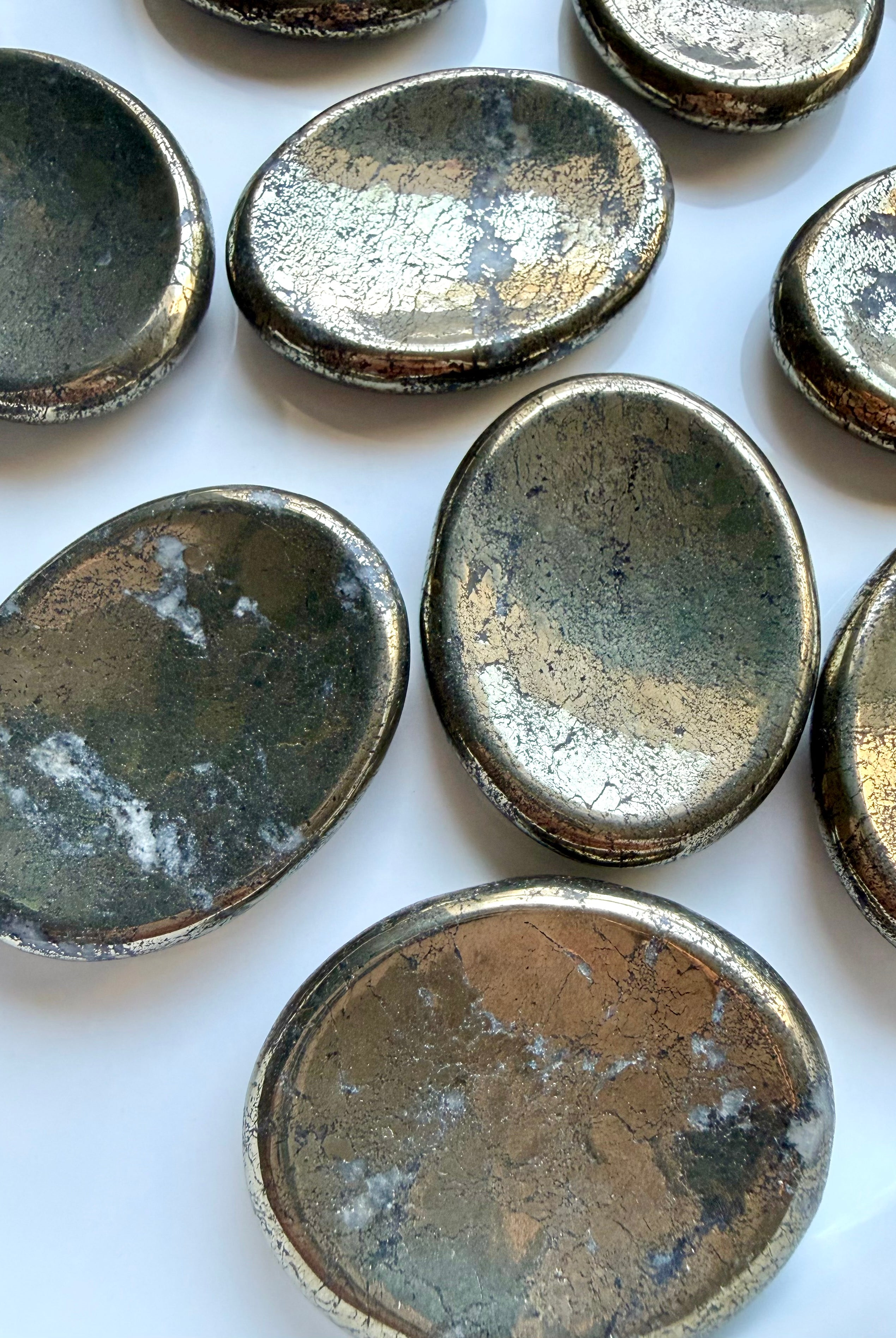 Polished Pyrite worry stones with gold, brass and bronze tones for confidence, prosperity and manifestation