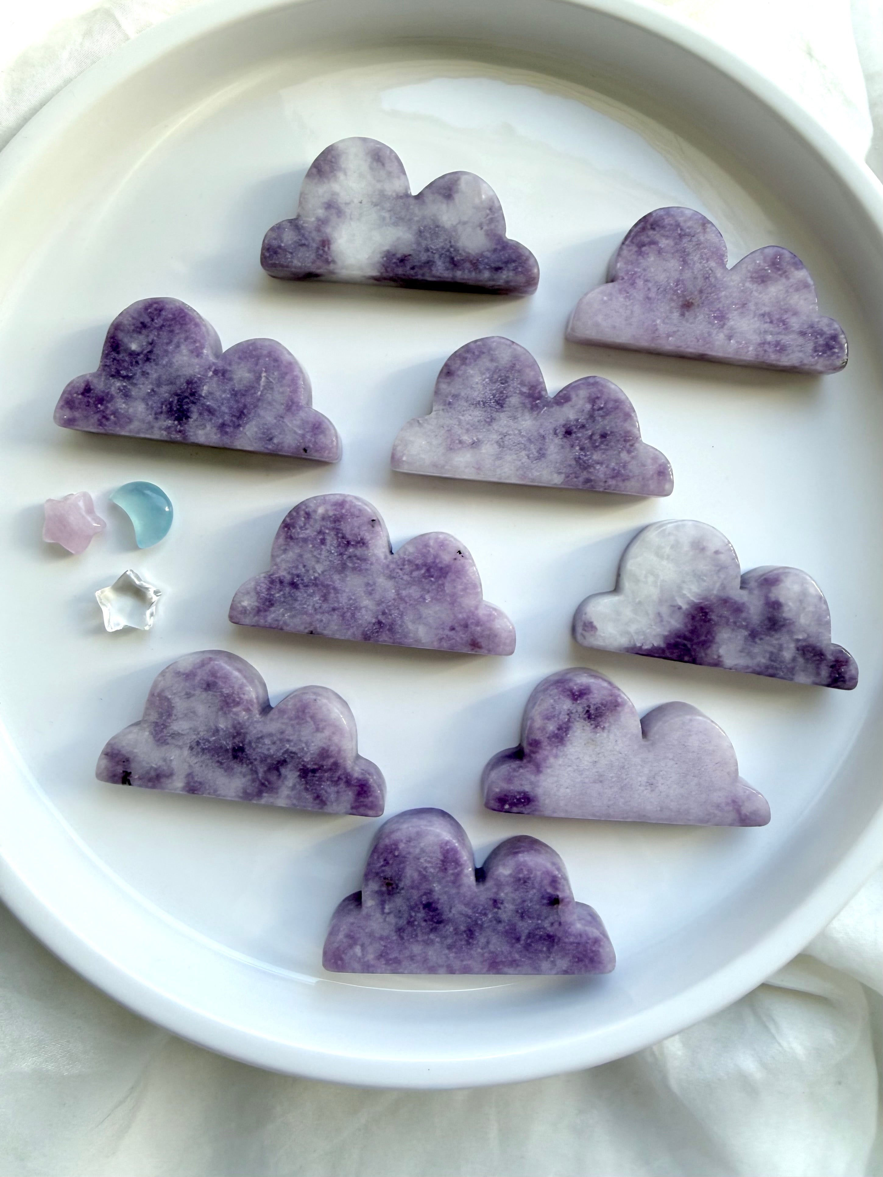 Lepidolite cloud crystal carvings in soft lilac tones with natural patterning and calming energy