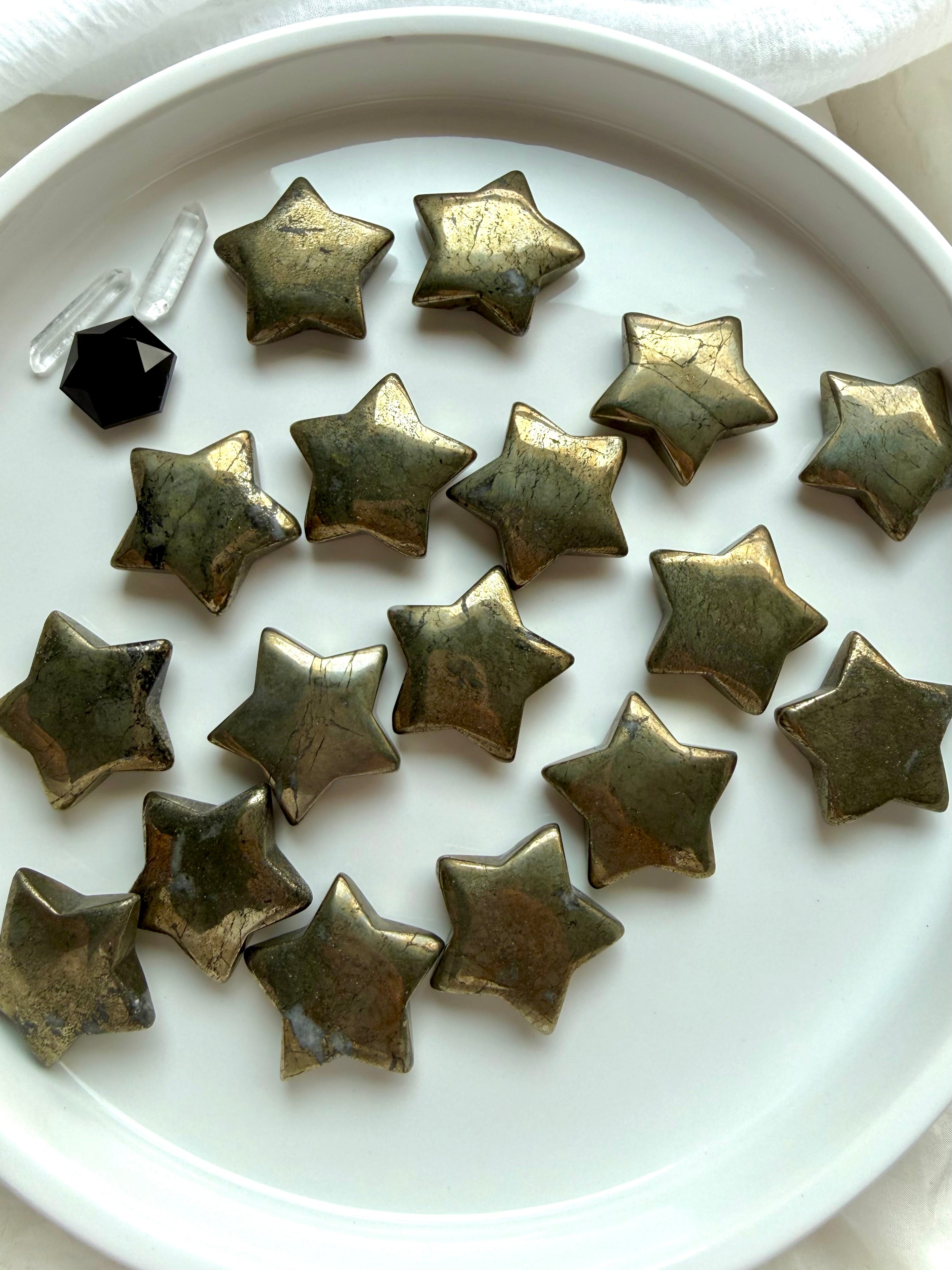 Pyrite star crystals arranged together with golden metallic luster for abundance and manifestation