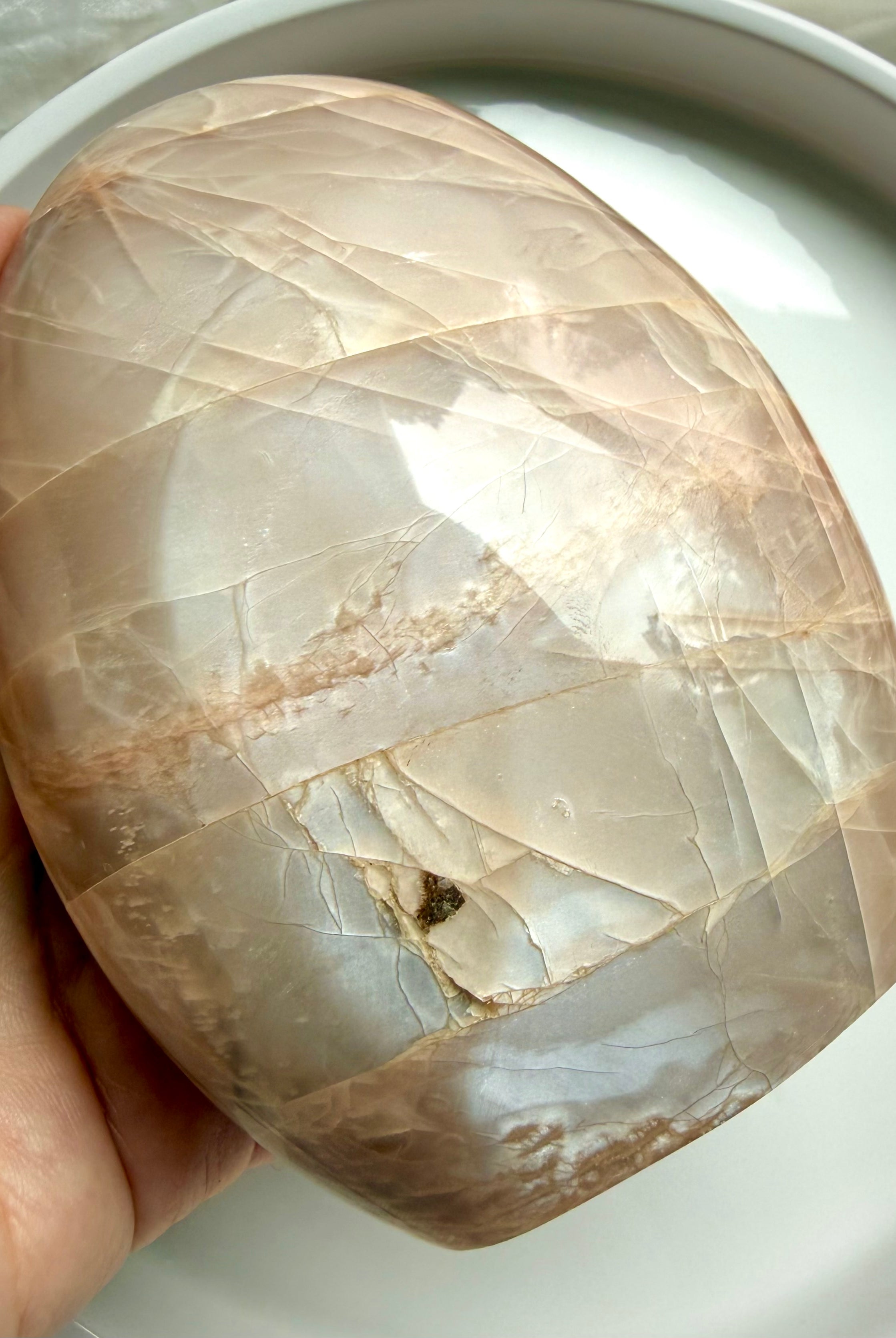 Polished Peach Moonstone freeform with soft shimmer, creamy banding, and feminine calming energy