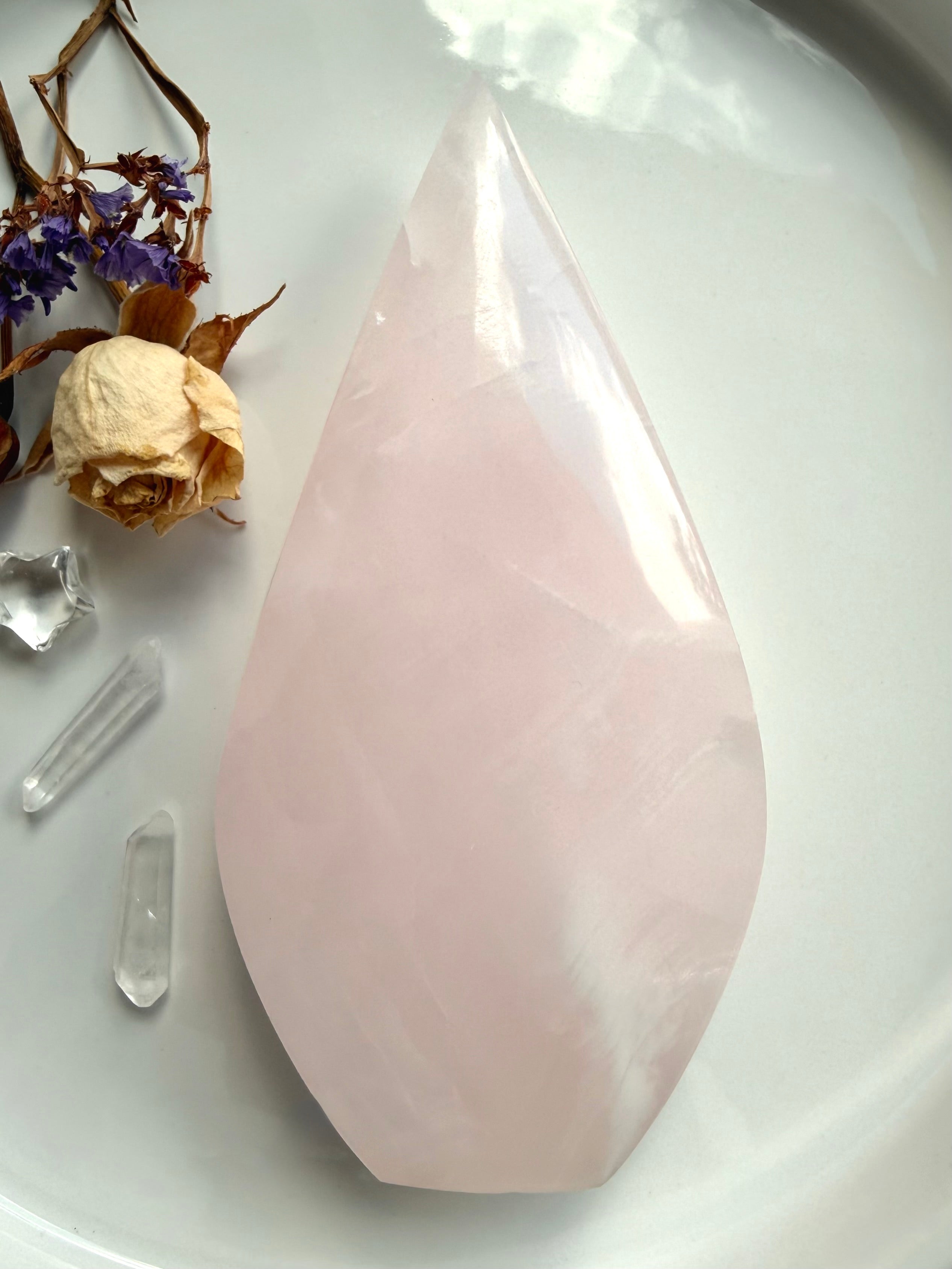 One of a kind Mangano Calcite flame crystal displaying gentle translucency and natural cloud-like internal formations