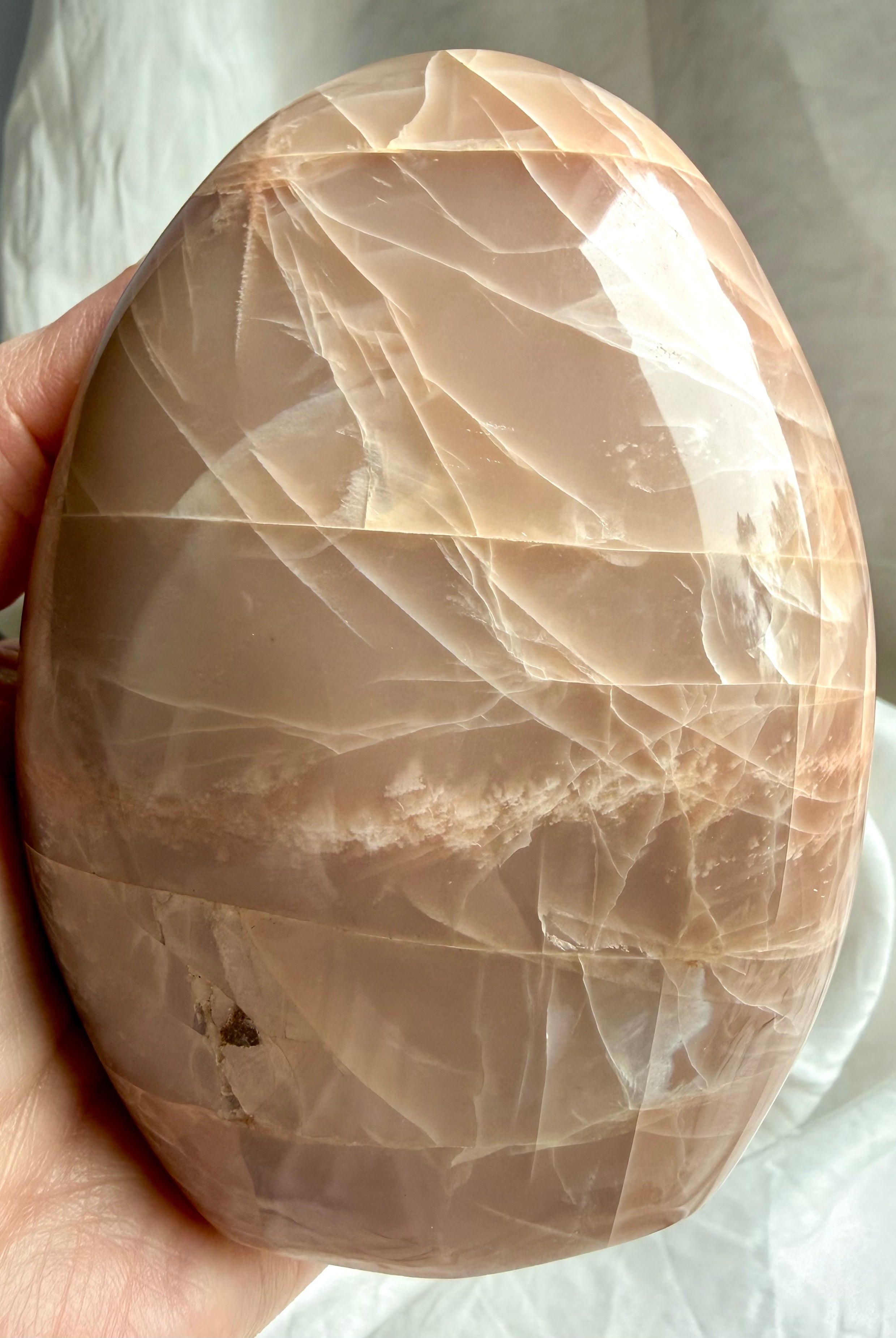 Large Peach Moonstone freeform with layered natural patterns, silvery sheen, and warm peach tones