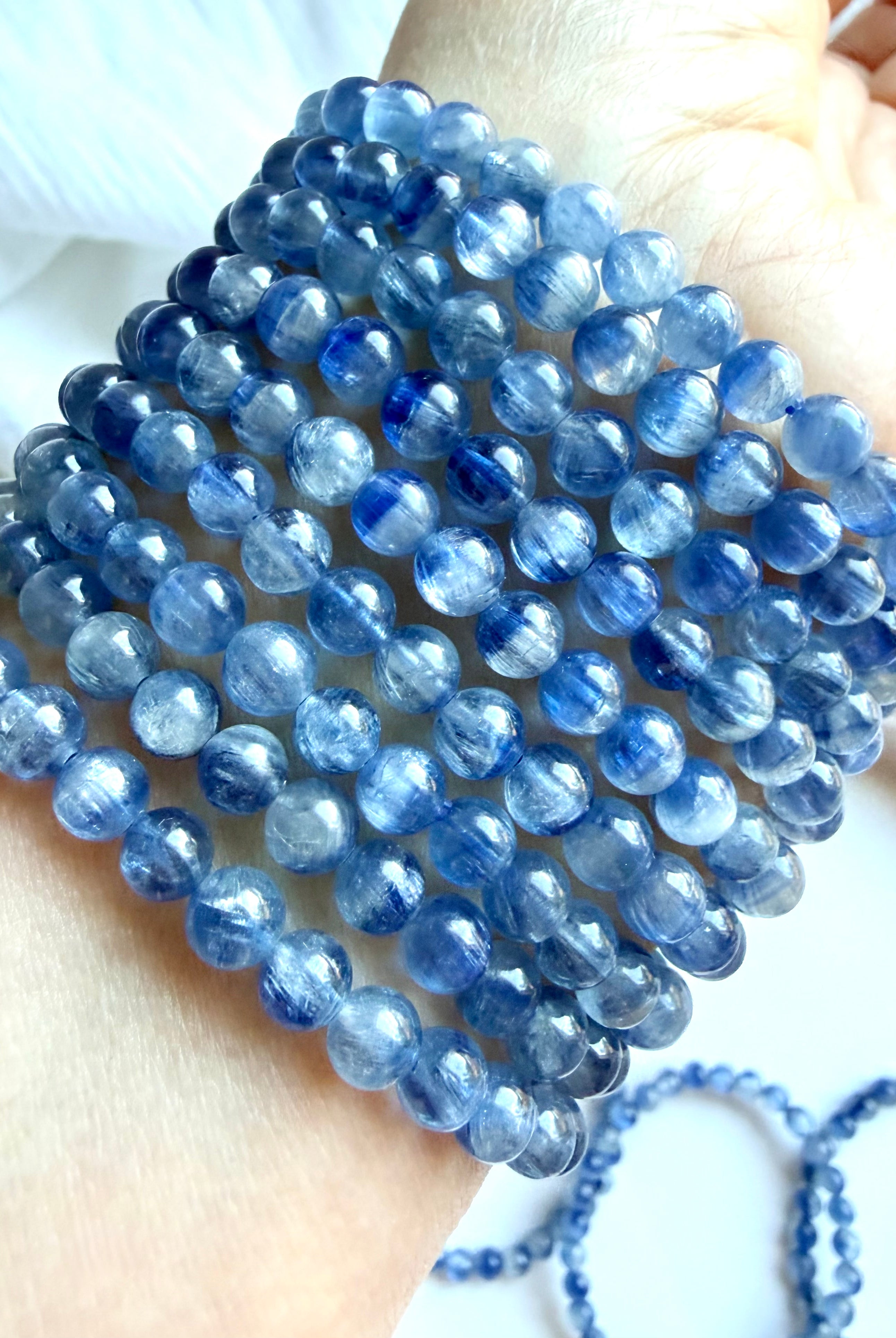 Blue Kyanite bracelet with translucent blue gemstones in icy blue, cornflower, and sapphire tones