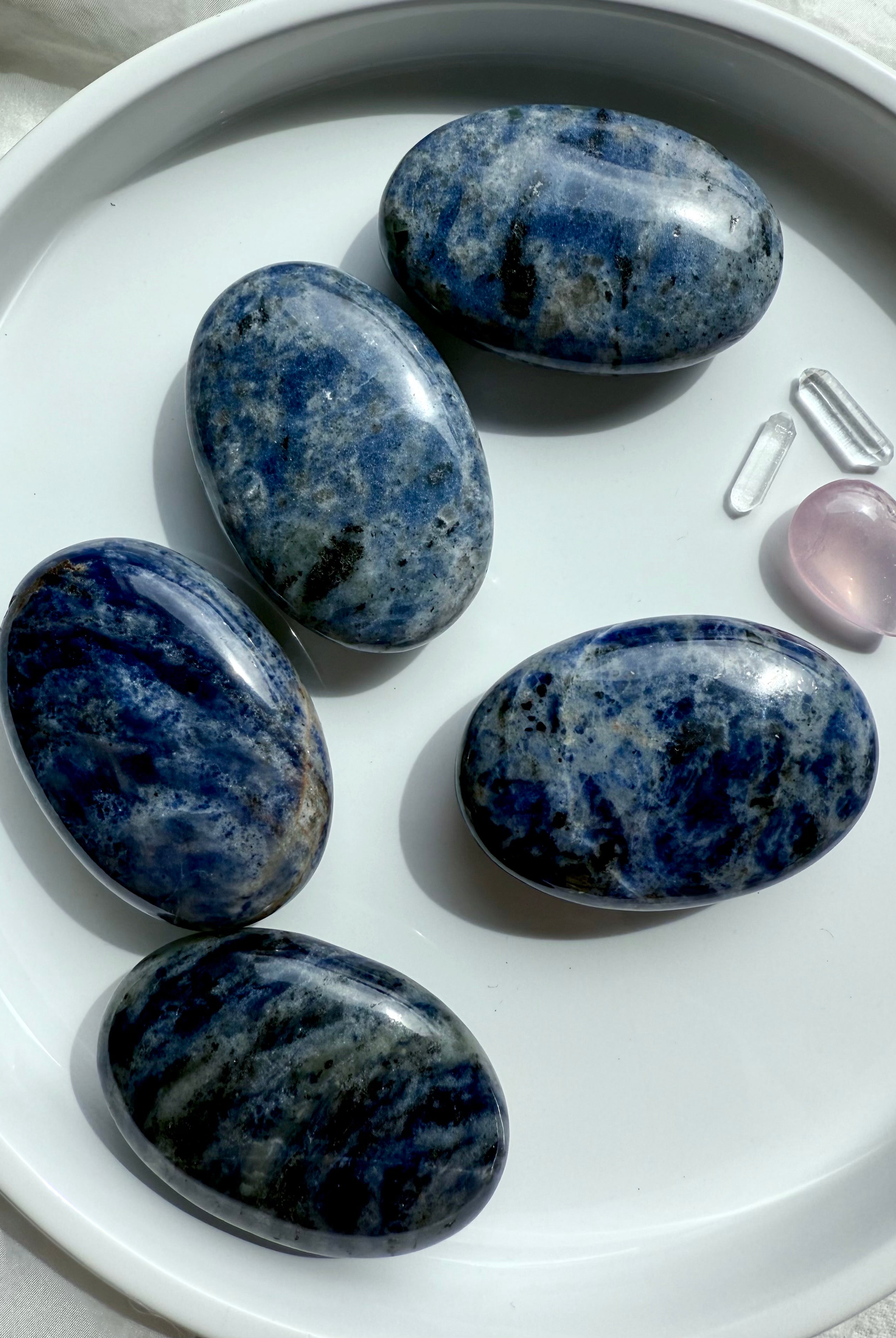 High quality blue Sodalite Palm Stones, a Throat Chakra crystal that helps you speak your truth