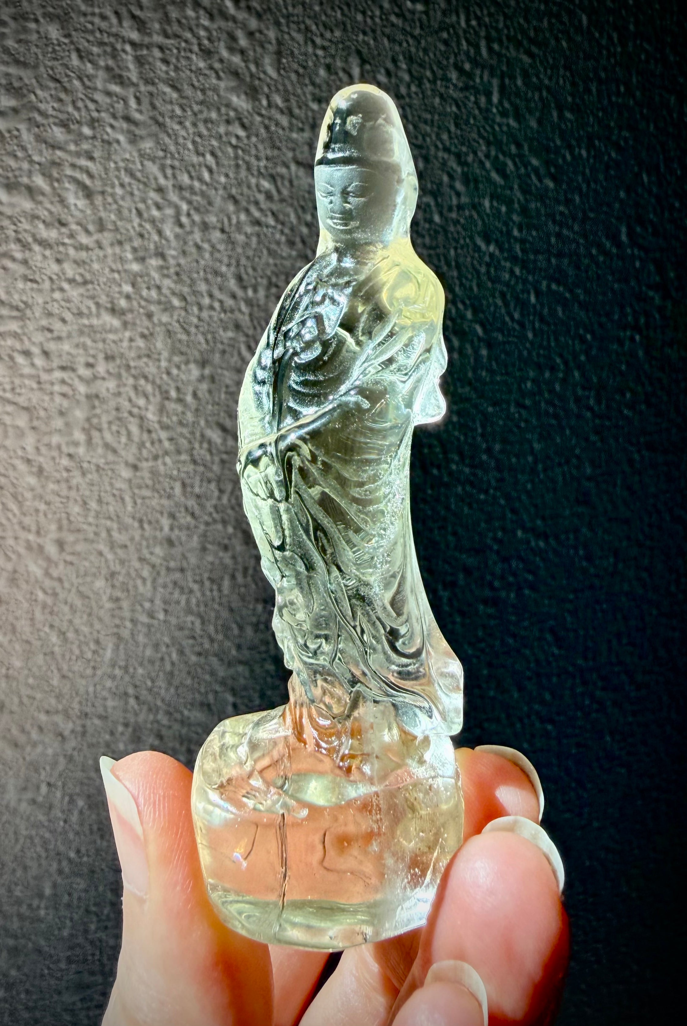 citrine Quan Yin statue carved from natural crystal with golden tones for joy abundance and spiritual protection