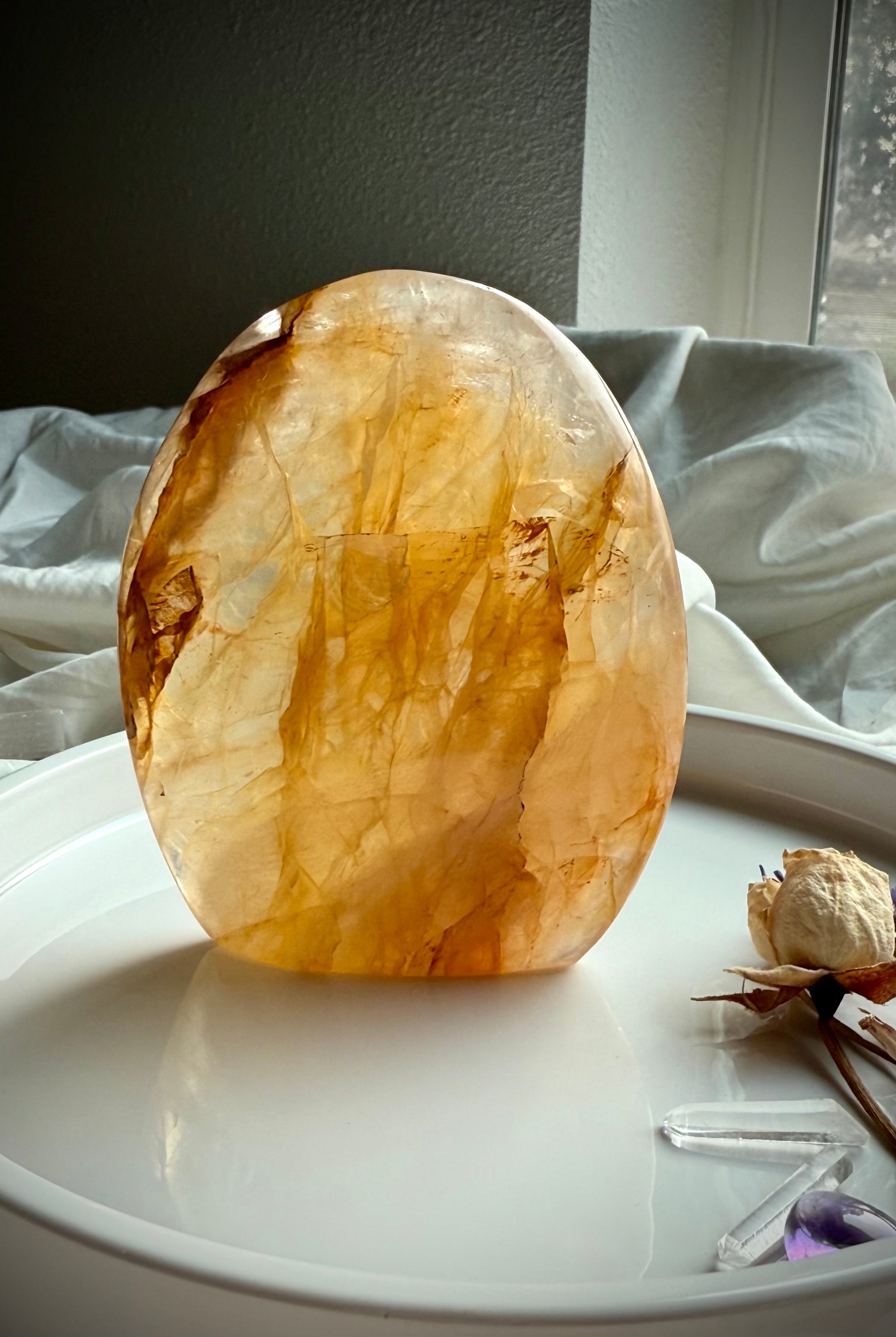 Golden Healer Quartz freeform with luminous golden translucence and polished sculptural crystal shape