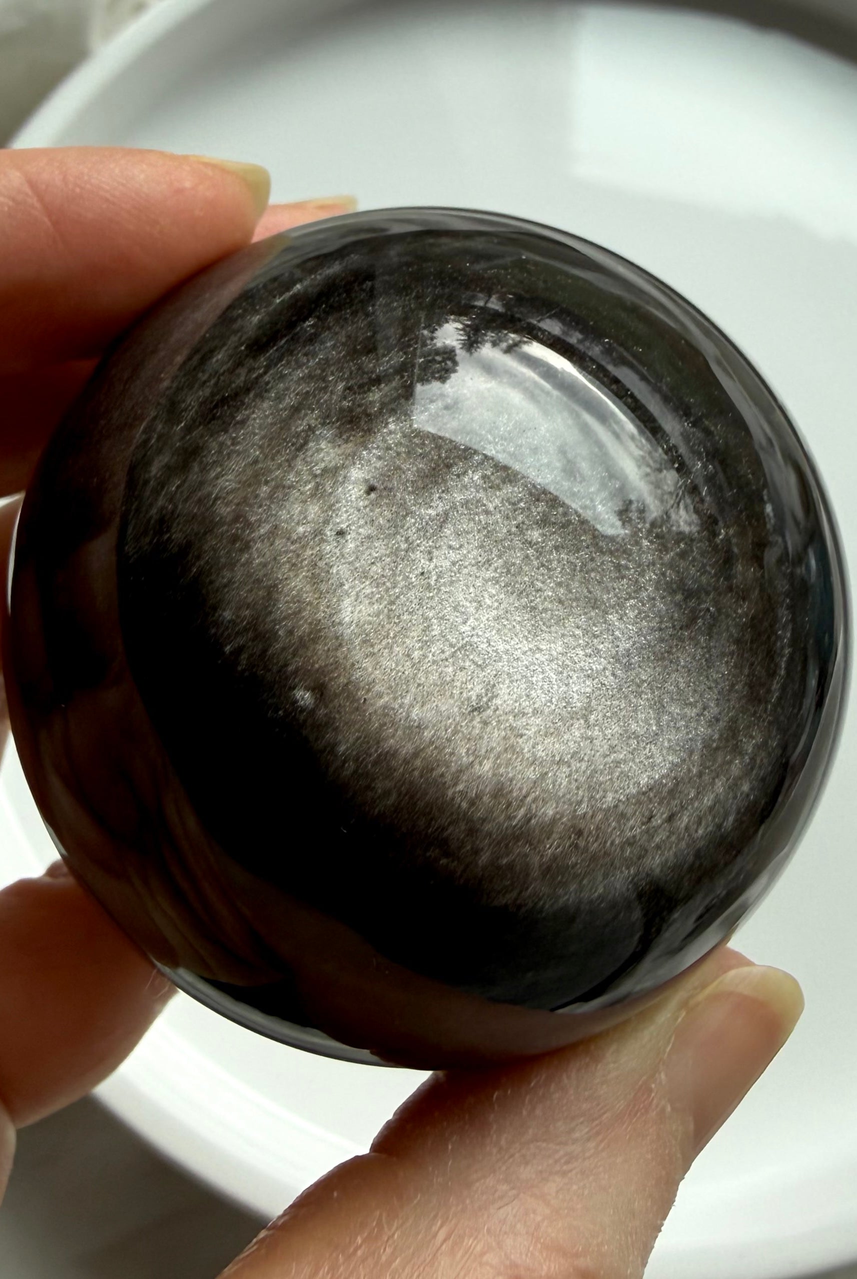 Silver Sheen Obsidian sphere crystal ball with luminous silver flash for protection, grounding, and intuitive clarity