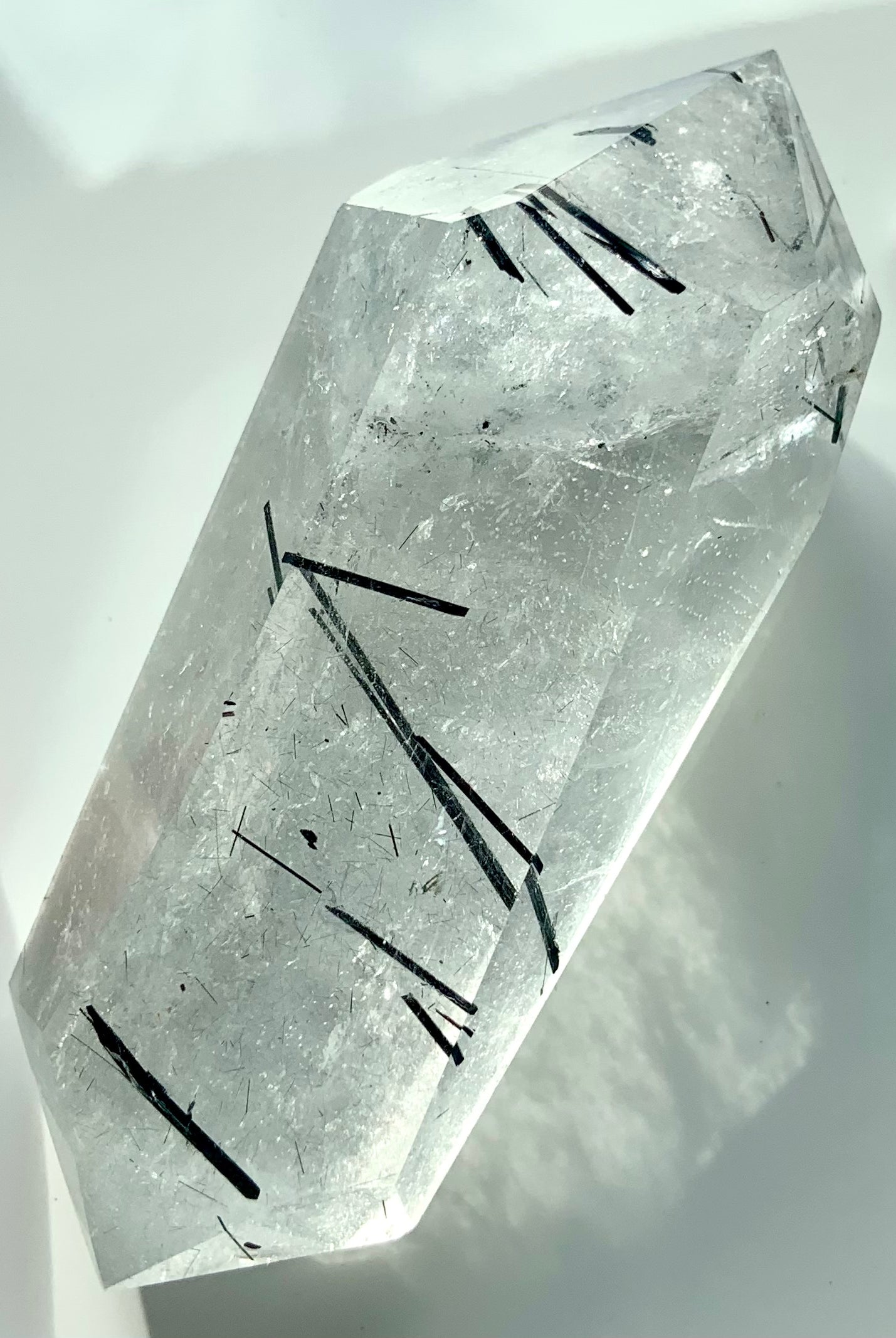 Double Terminated Black Tourmaline in Quartz Point shown on a white background. High Quality Tourmalated Quartz makes a great Crystal Collector Gift