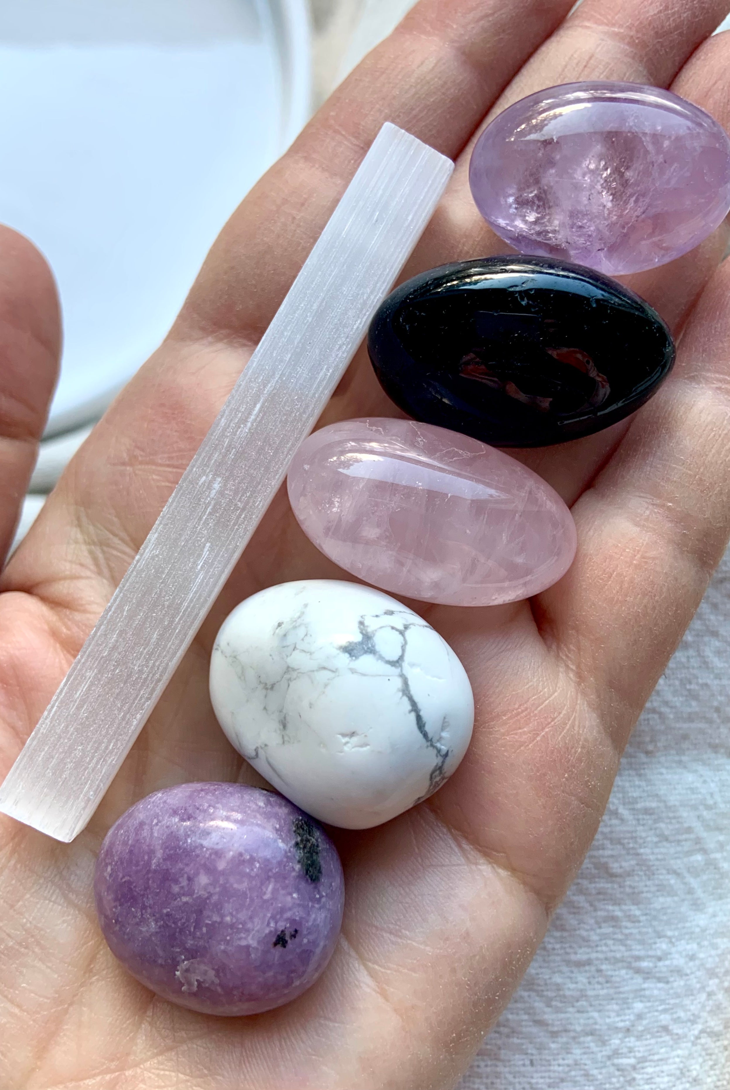 Sweet Sleep Crystal Set stones displayed in palm, includes 6 polished crystals for rest and dreams
