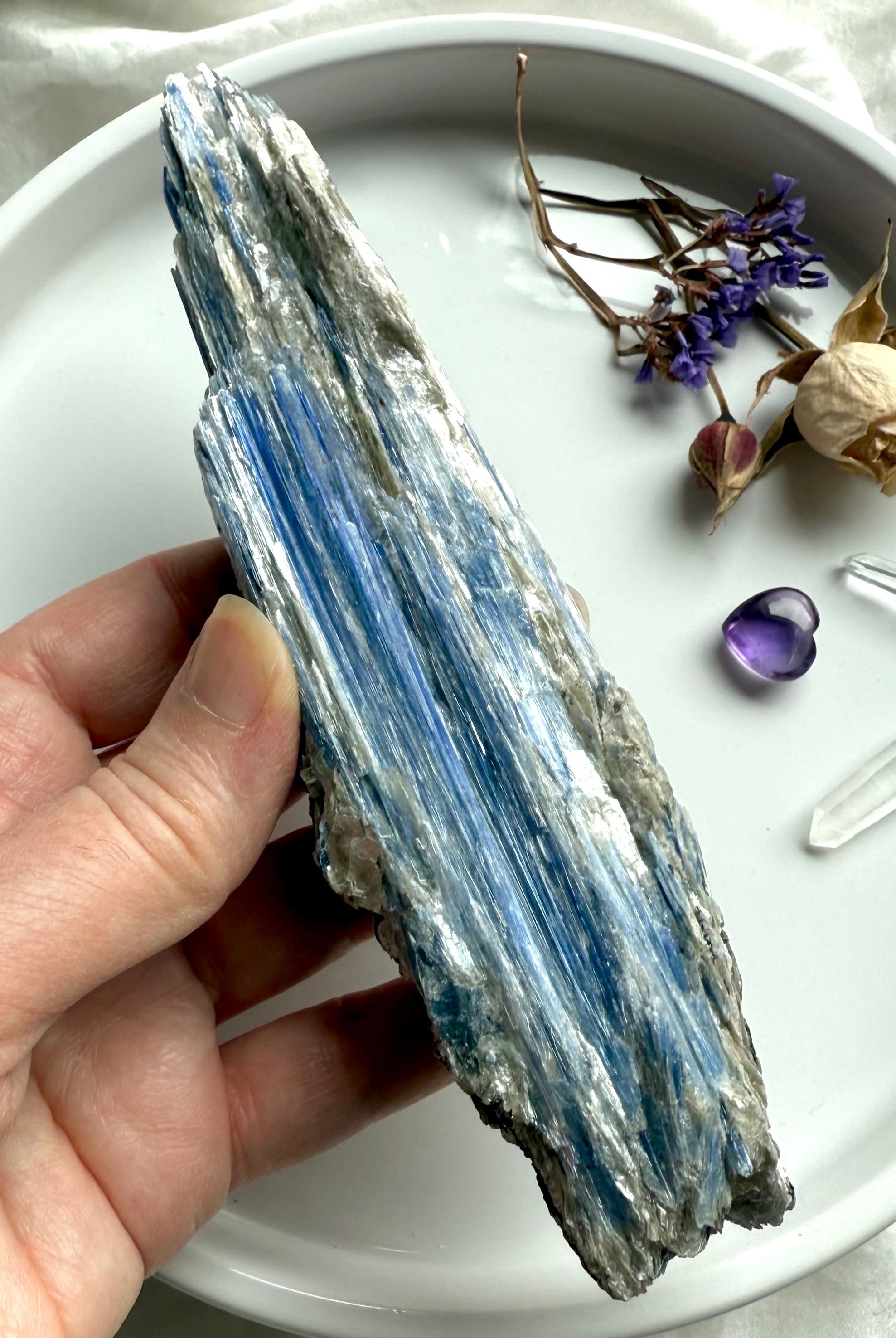 Raw blue kyanite crystal with muscovite inclusions, layered bladed formation and natural silvery sparkle, one of a kind mineral specimen