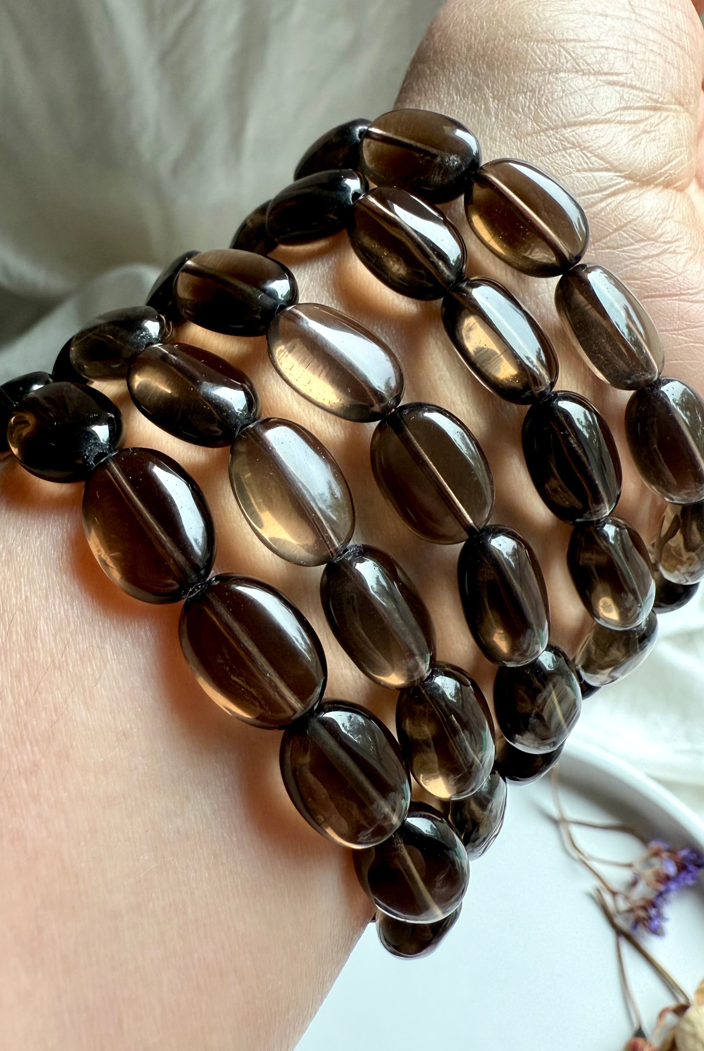 Smoky Quartz Bracelet with high-clarity oval beads – grounding crystal jewelry for protection, clarity, and energy clearing