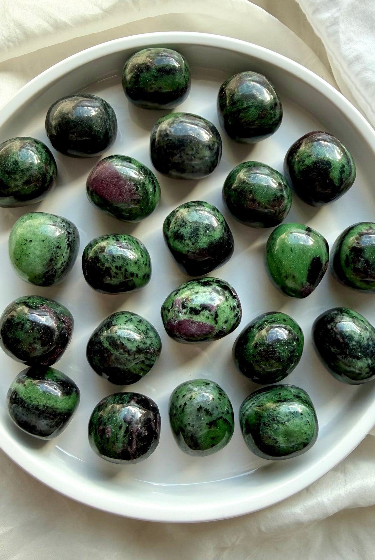 Ruby Zoisite tumbled stones featuring vibrant green Zoisite, deep ruby pink inclusions and polished natural gemstones for emotional healing