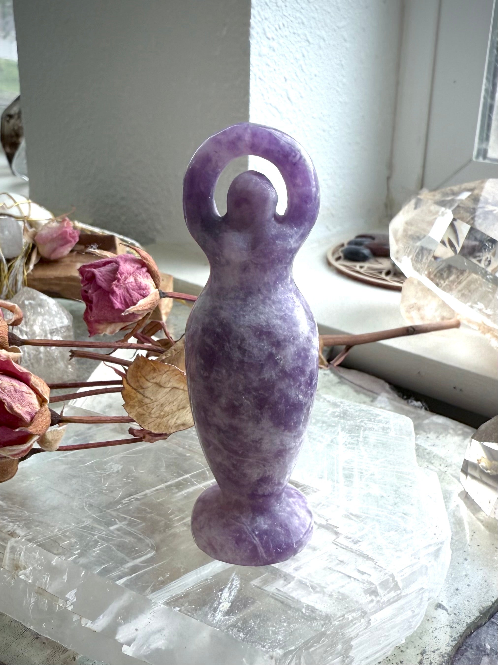Place a crystal goddess carving on your altar to elevate your sacred space