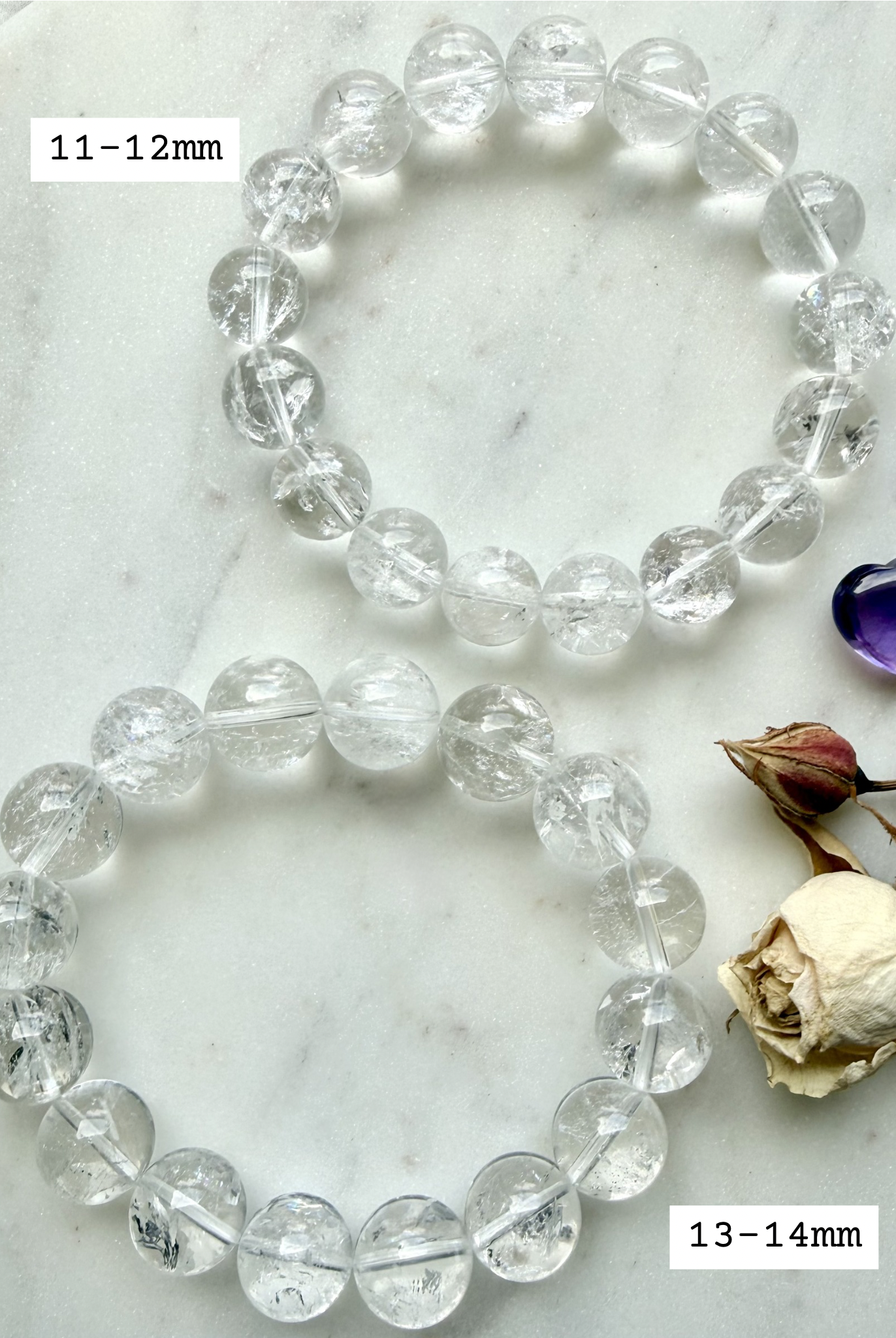Stretchy Rainbow Quartz bracelet beside dried flowers showing bead size comparison