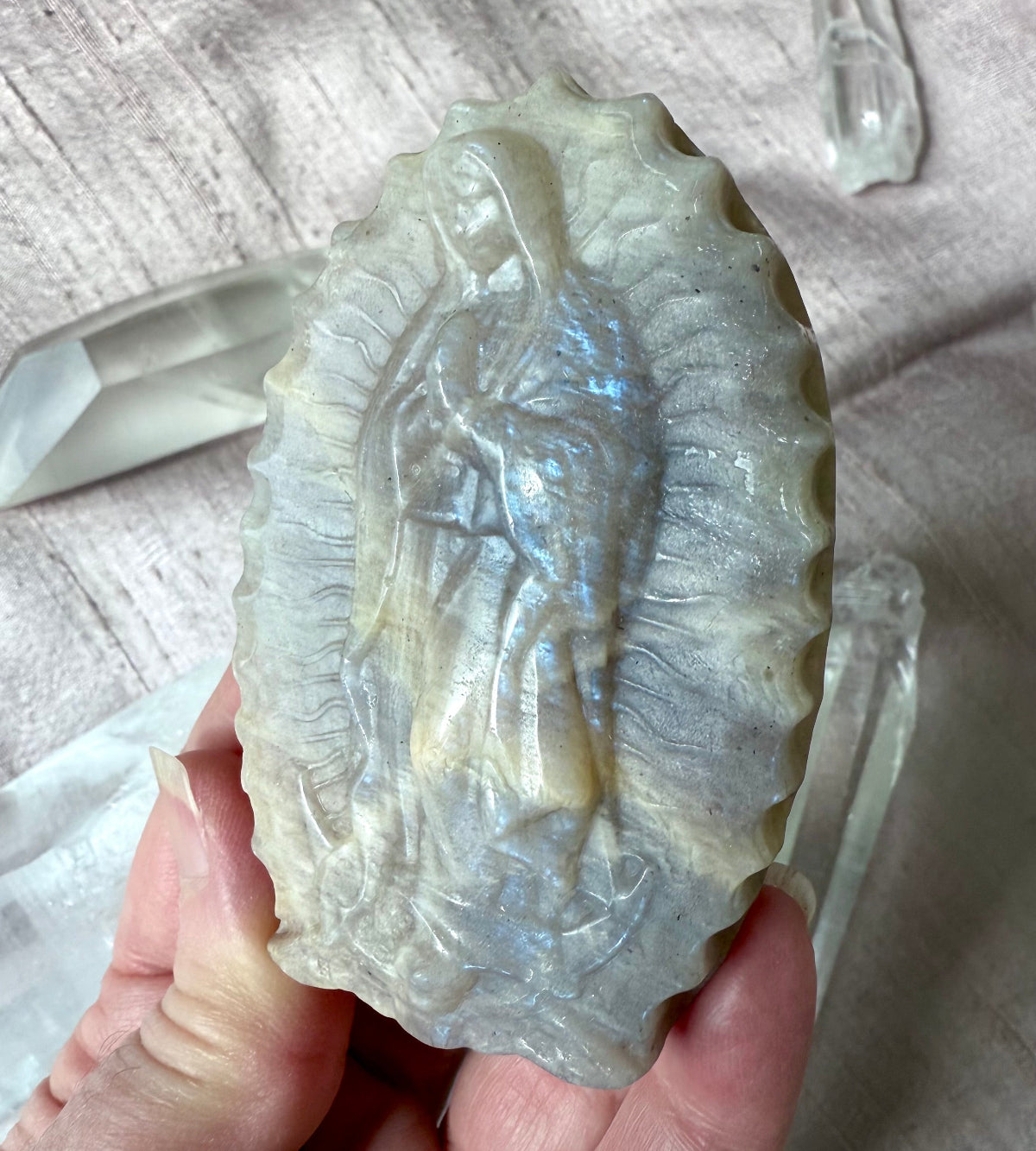 moonstone carving with blue flash for intuition and new beginnings
