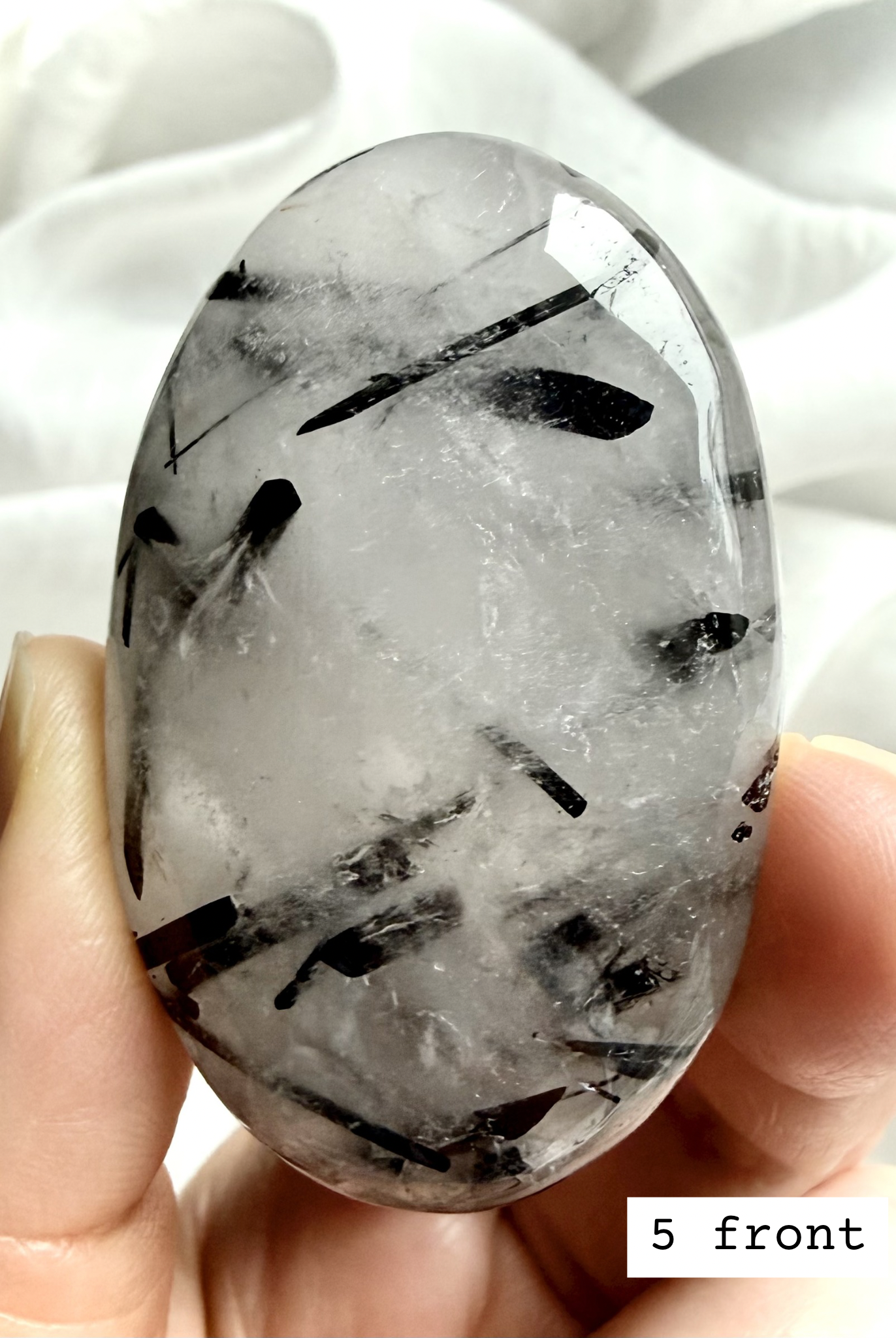 Black Tourmaline in Quartz palm stone 5 front view Tourmalinated Quartz for grounding and protection