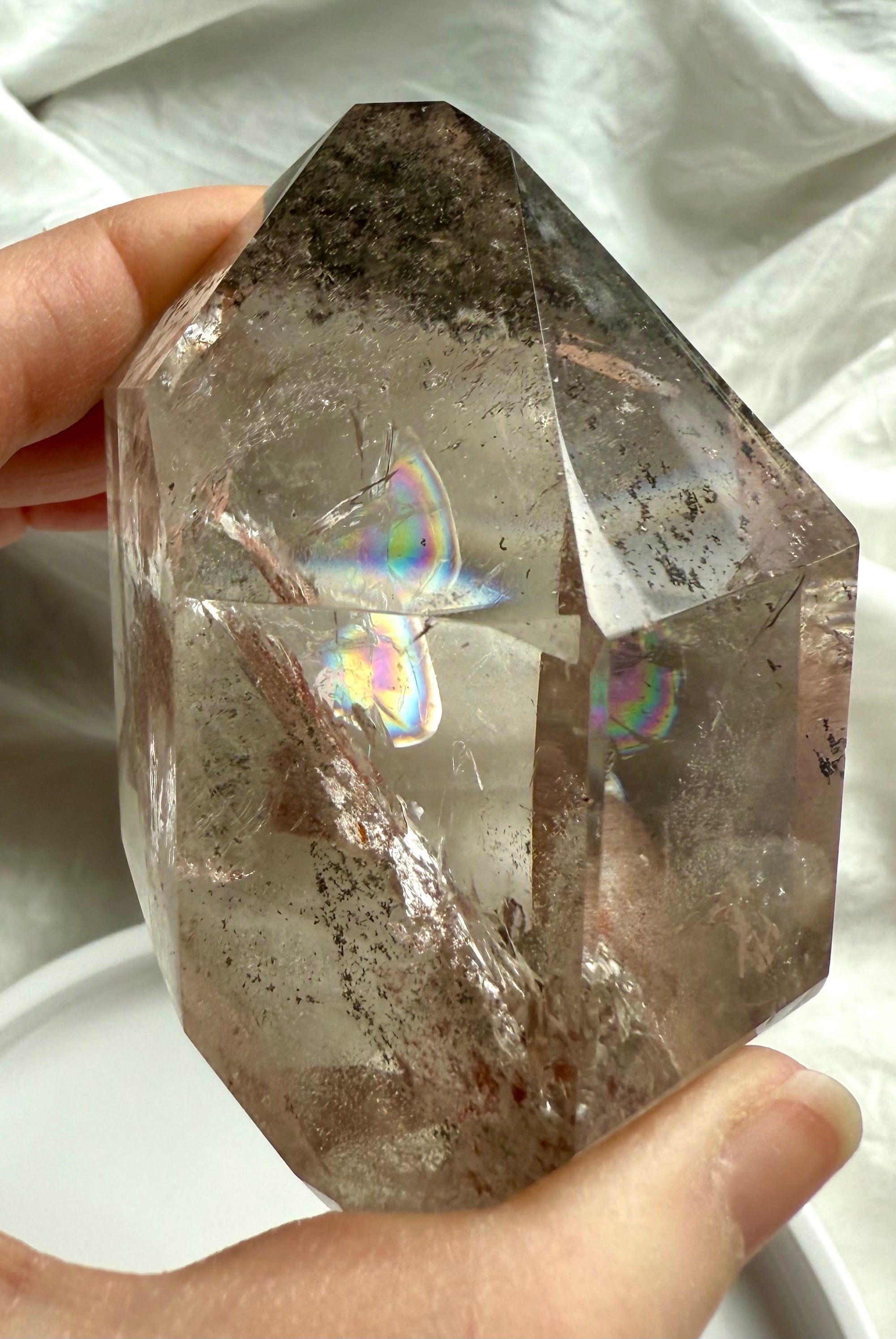 A Garden Quartz Phantom Crystal with green chlorite layers loaded with rainbows + mineral inclusions