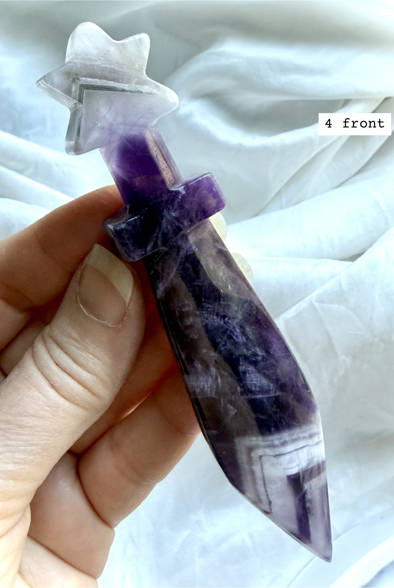 Dream Amethyst ritual knife carving with soothing purple tones and faceted blade shape