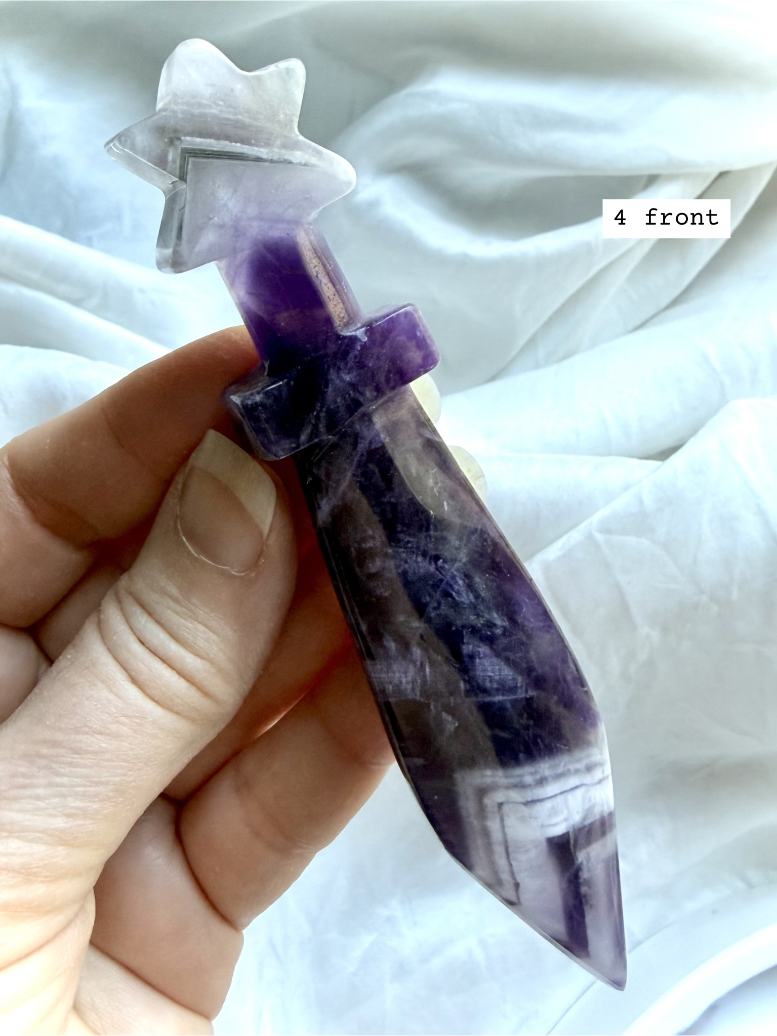 Dream Amethyst ritual knife carving with soothing purple tones and faceted blade shape
