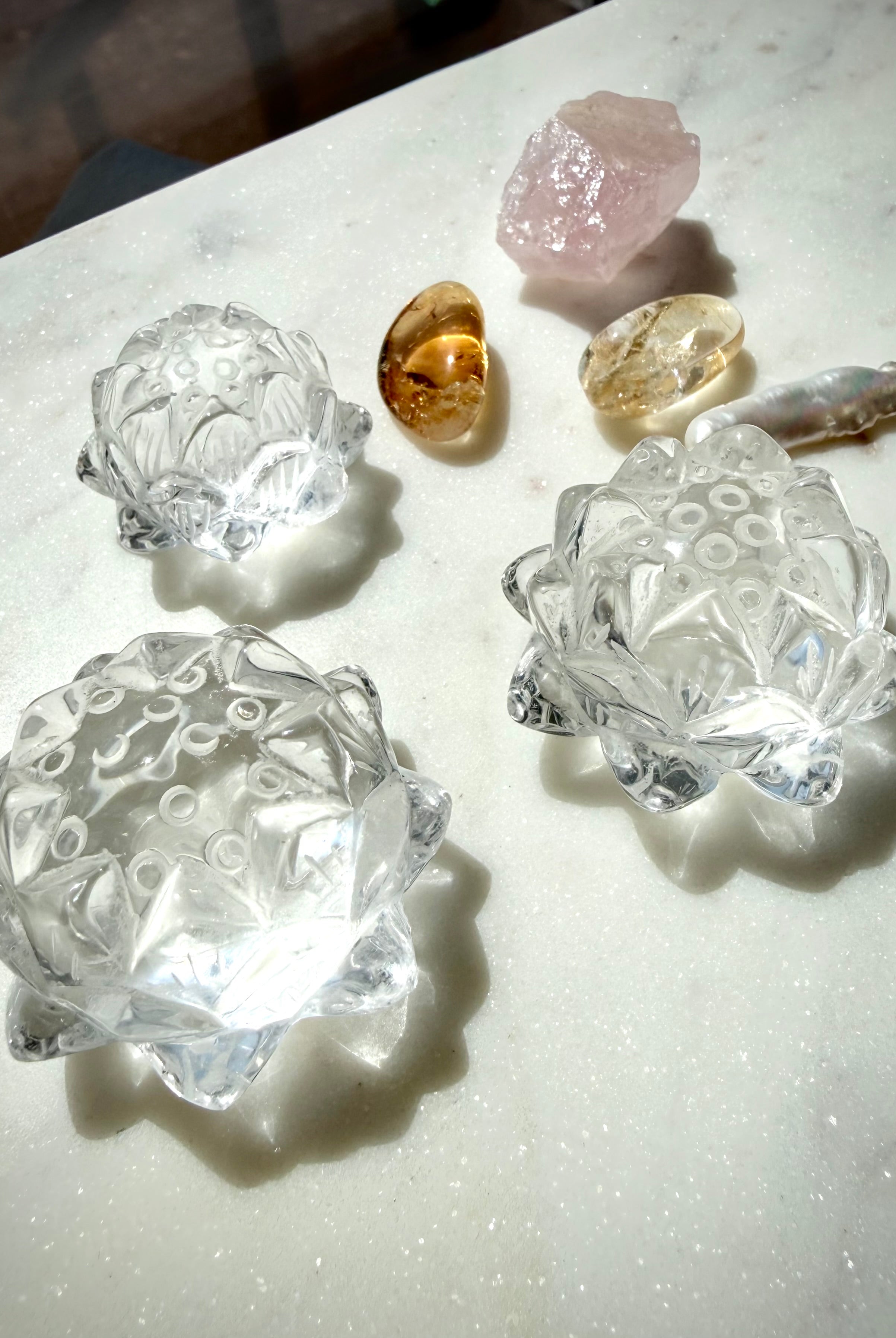 Clear Quartz lotus flower carvings with Citrine and other crystals for healing, clarity and new beginnings
