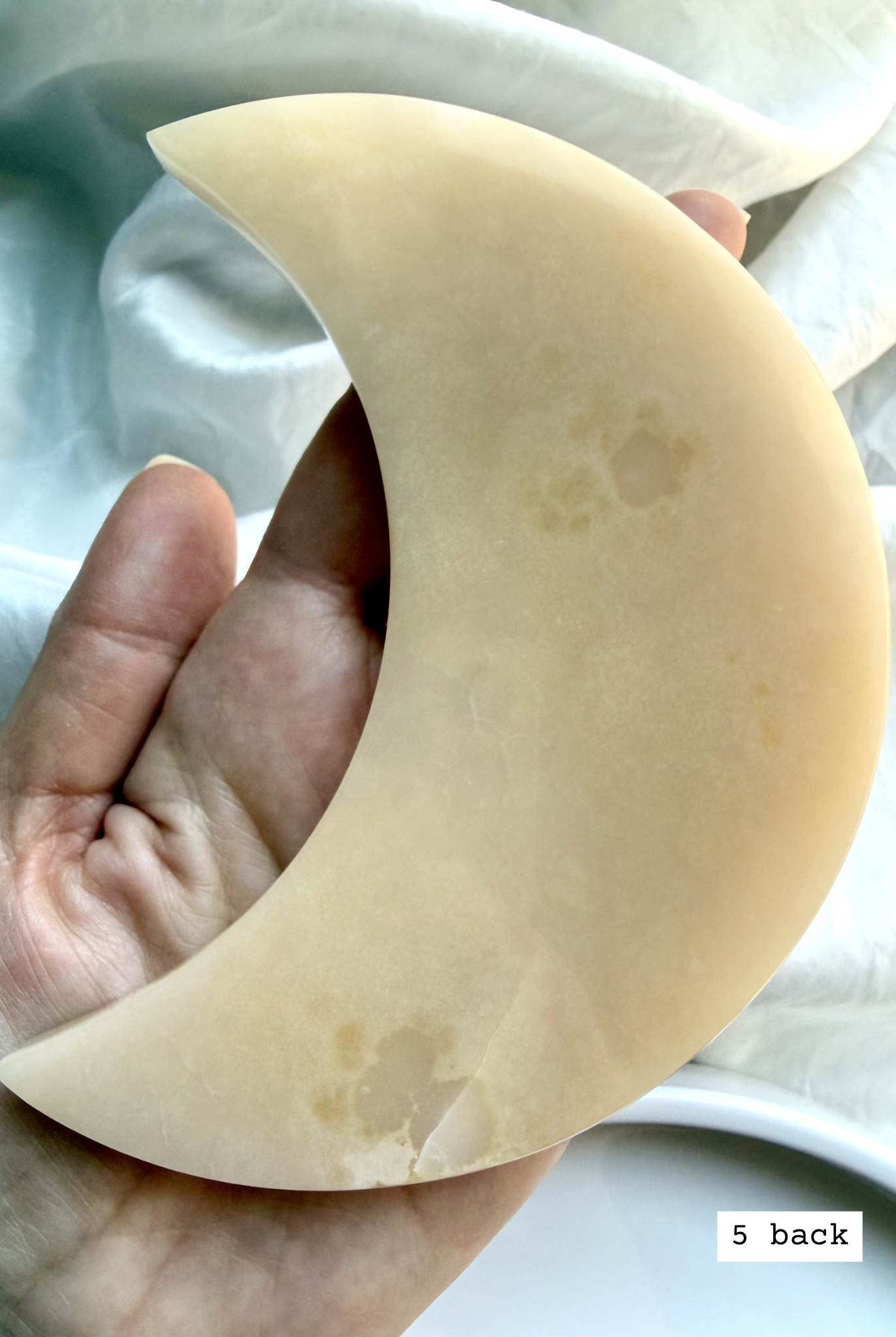 white onyx crescent moon plate # 5 back natural Mexican onyx crystal with soft beige tones and subtle banding