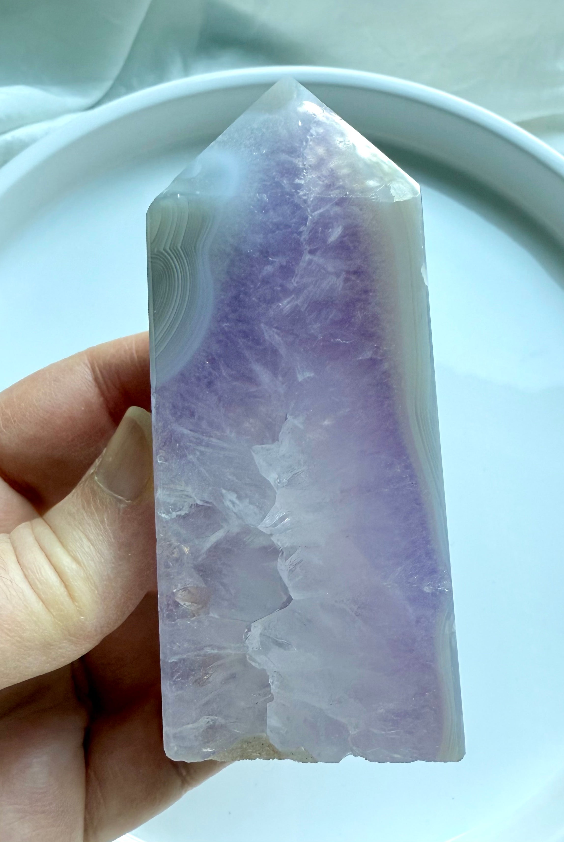 Amethyst and Agate Tower showing smooth polished faces and crystalline interior