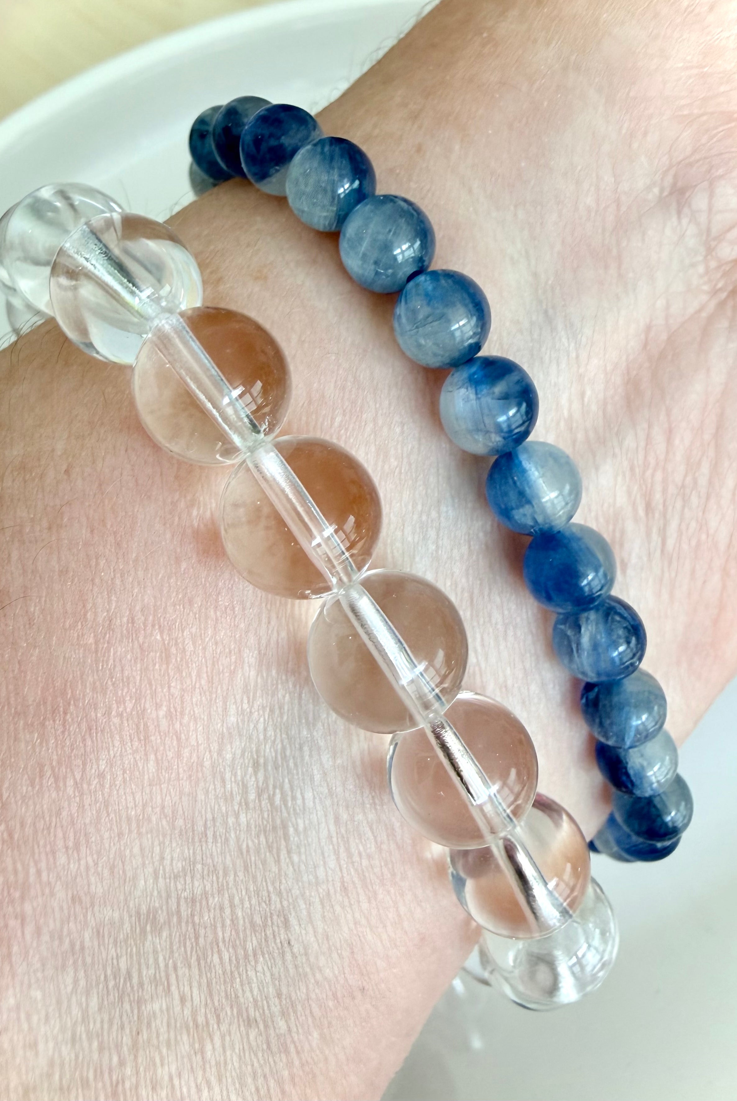 Clear Quartz bracelet stacked with Blue Kyanite bracelets for stylish crystal jewelry layering