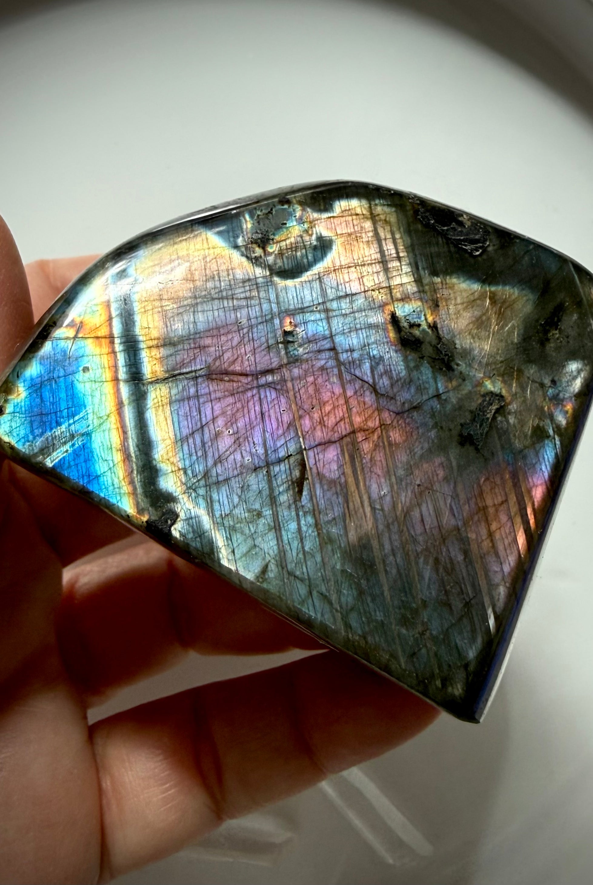 Polished rainbow Labradorite freeform with blue, pink, purple and gold flash