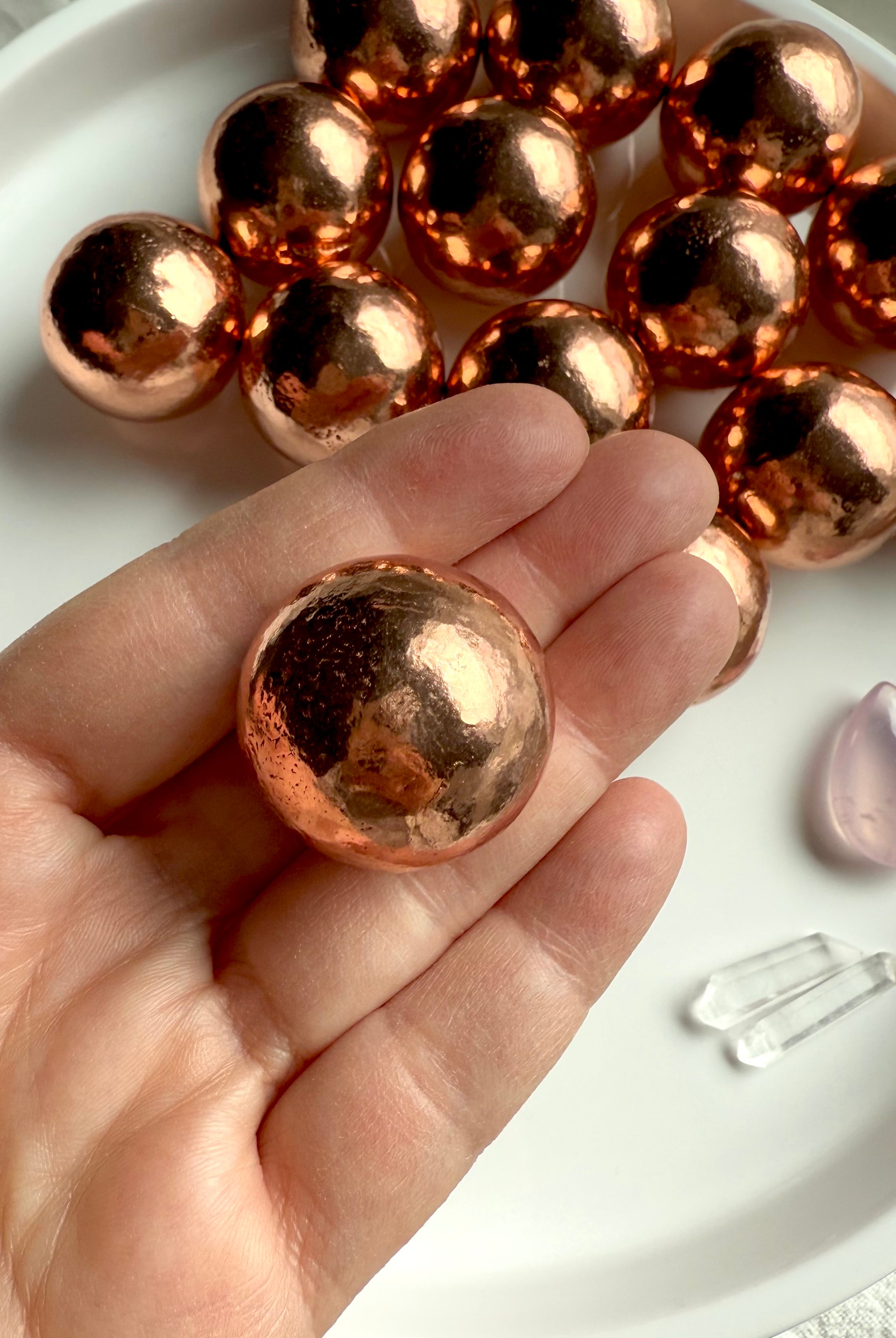 30 mm Michigan copper spheres shown on my hand for scale