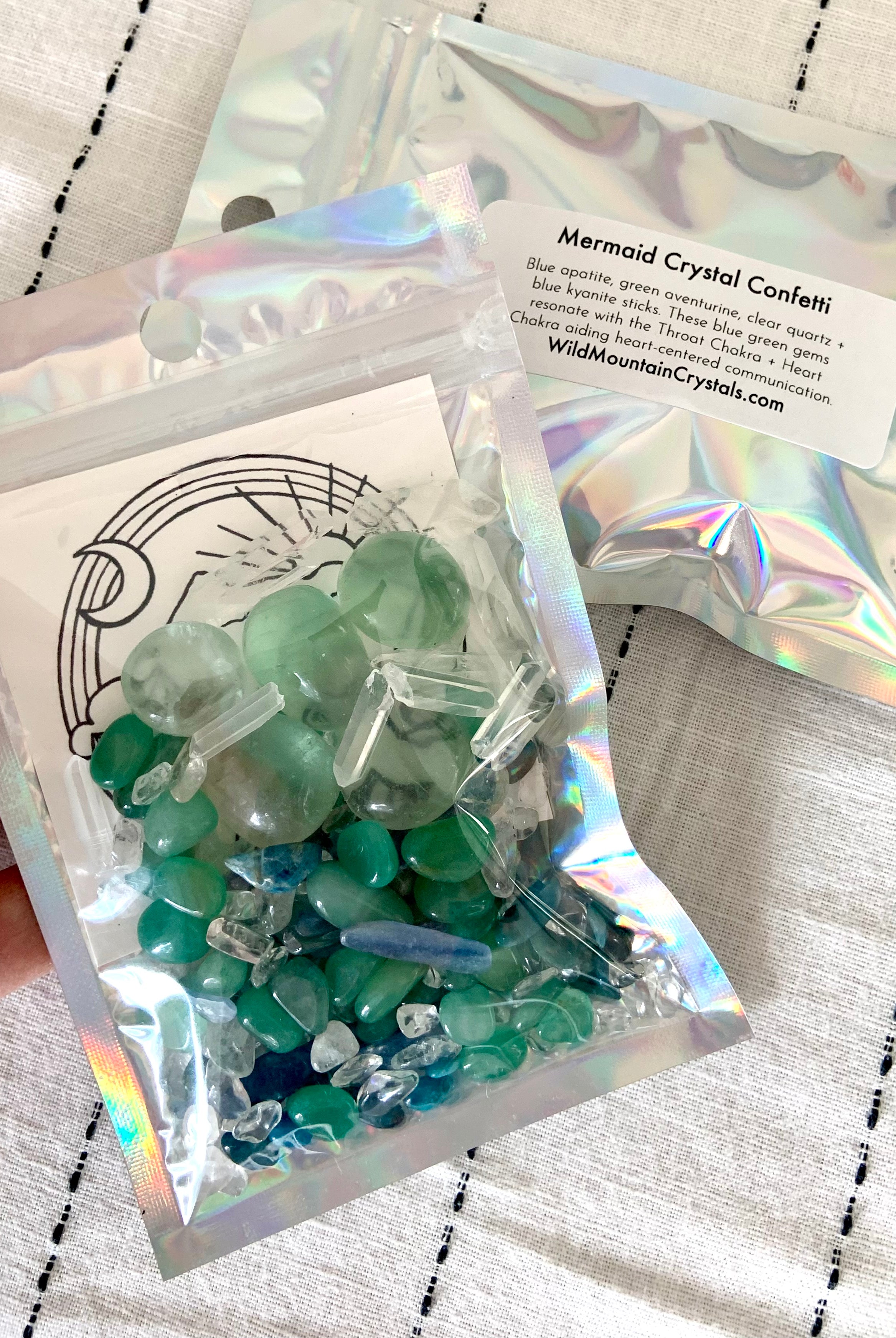 Showing the packaging for the Mermaid Crystal Confetti Mix with the chips and tumbles