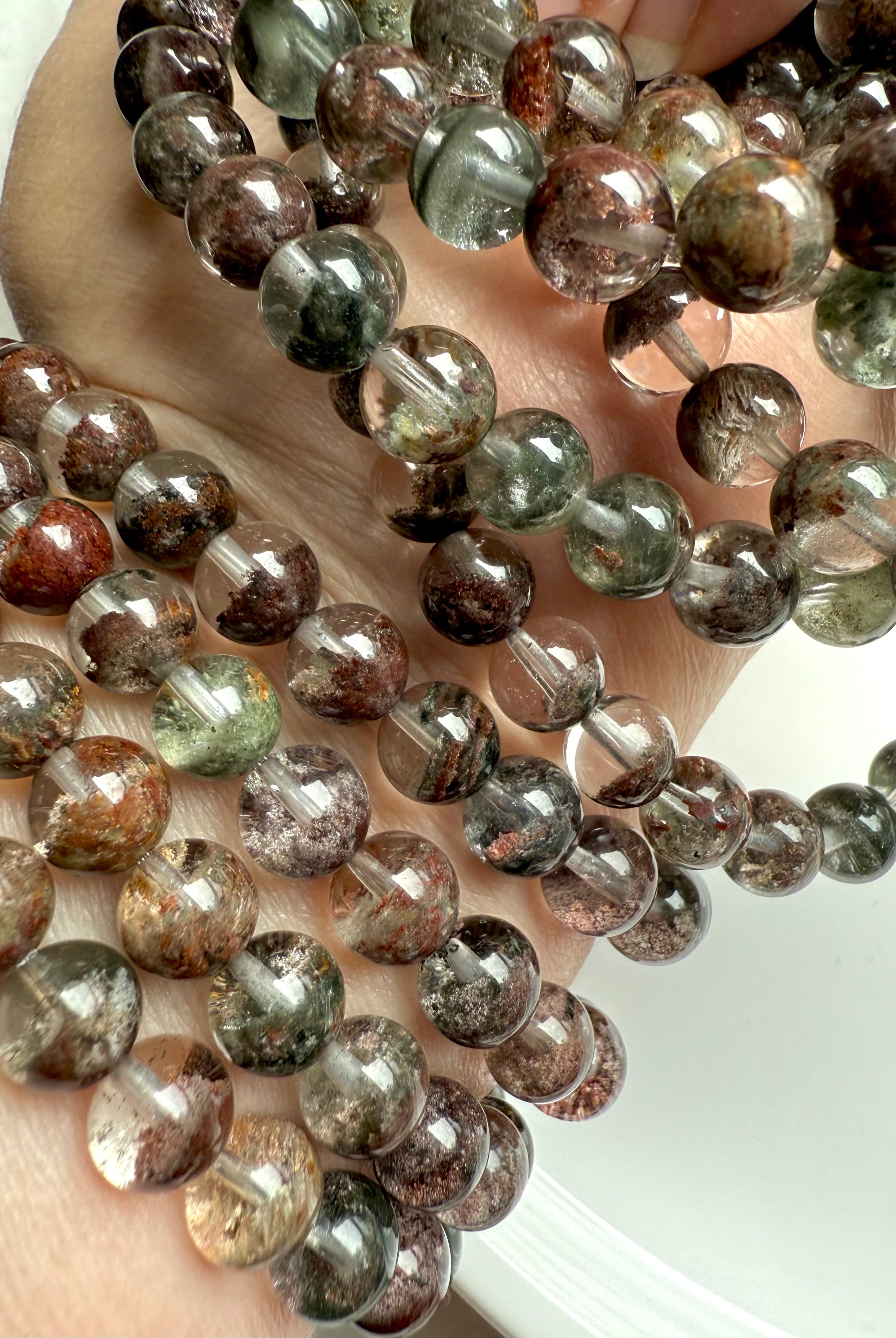 Garden Quartz healing crystal bracelet showing scenic mineral phantoms, a powerful tool for grounding and inner vision work